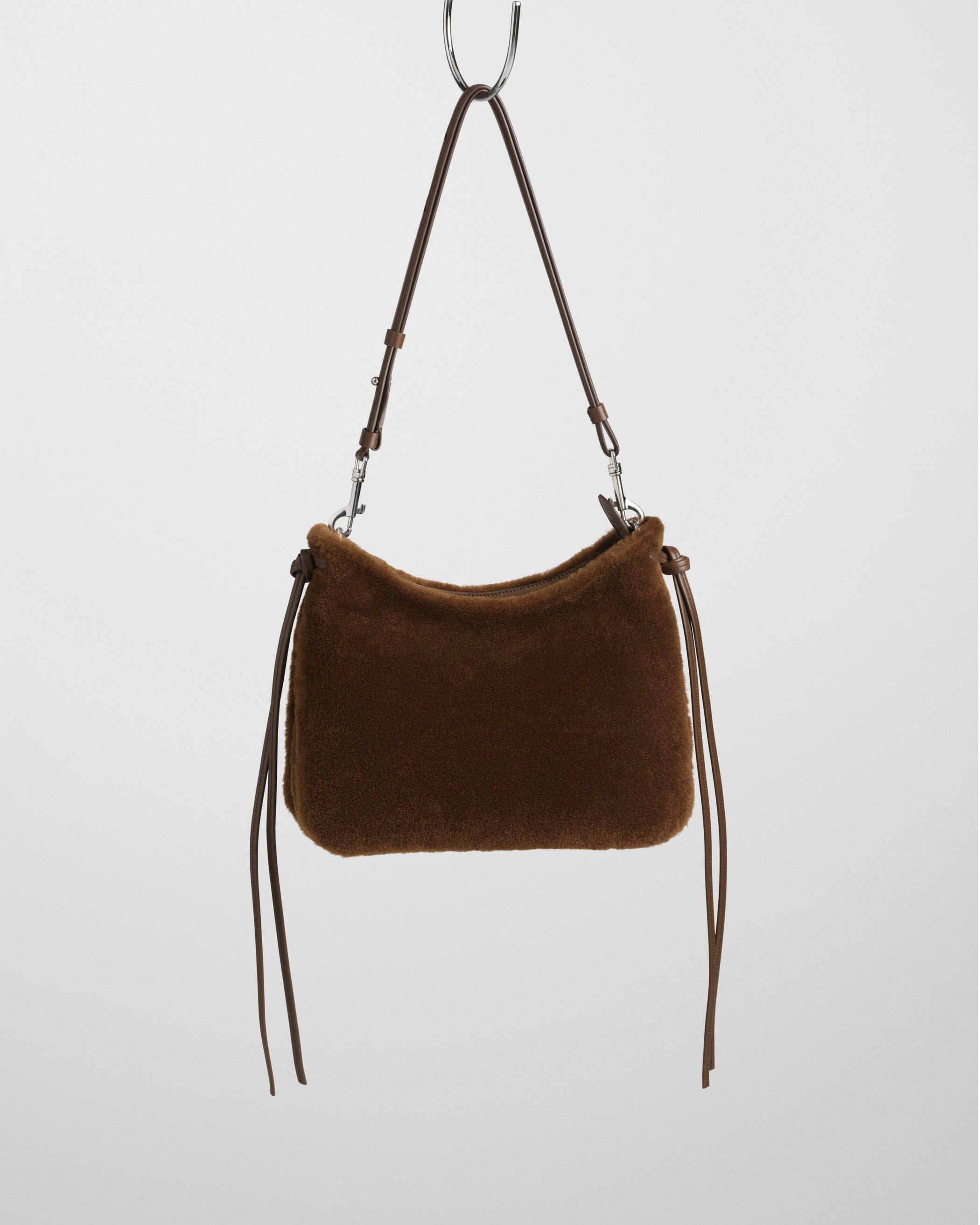 Front view of Small Gig Bag in ginger shearling