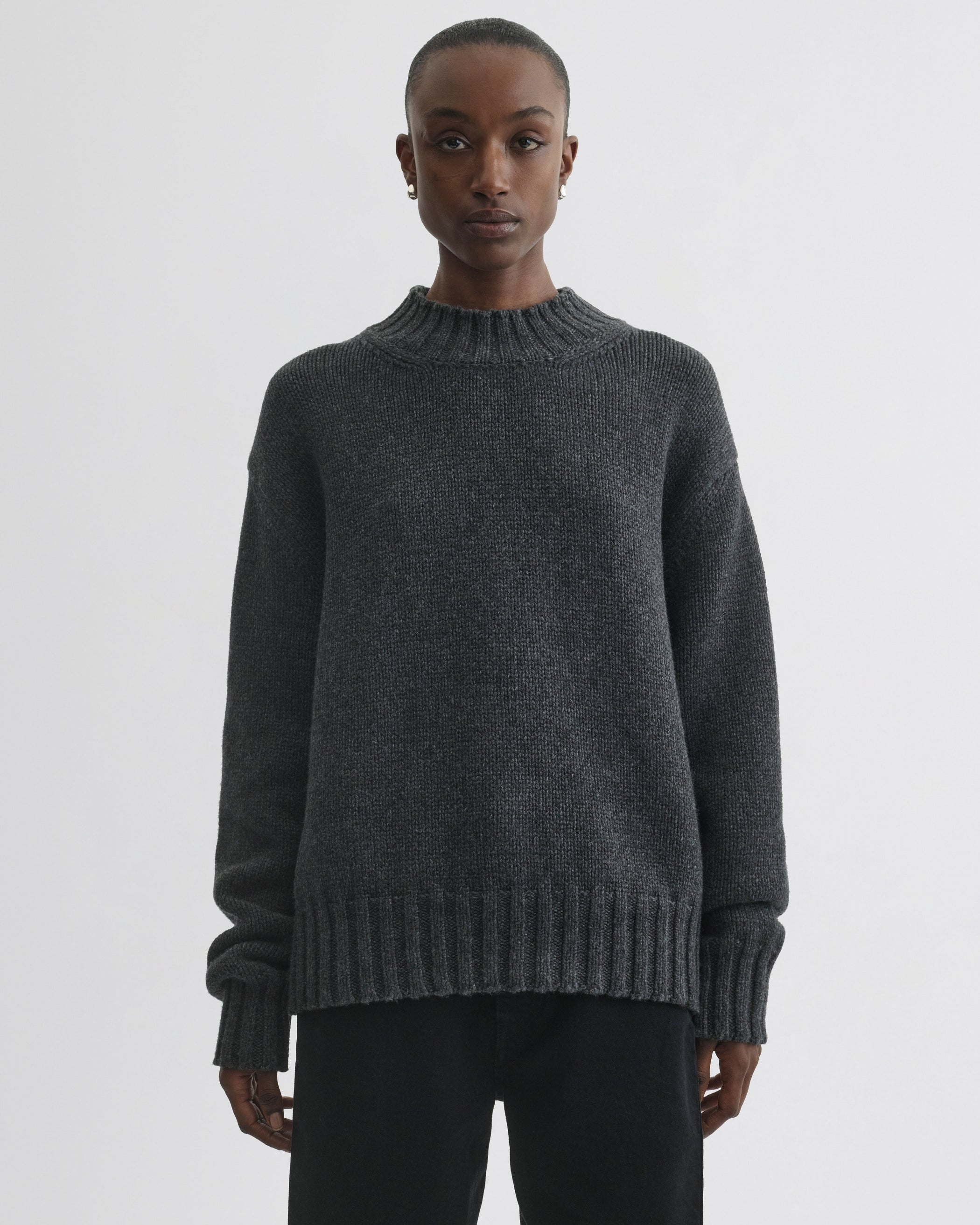 Front view of model wearing Crewneck Jumper in grey cashmere