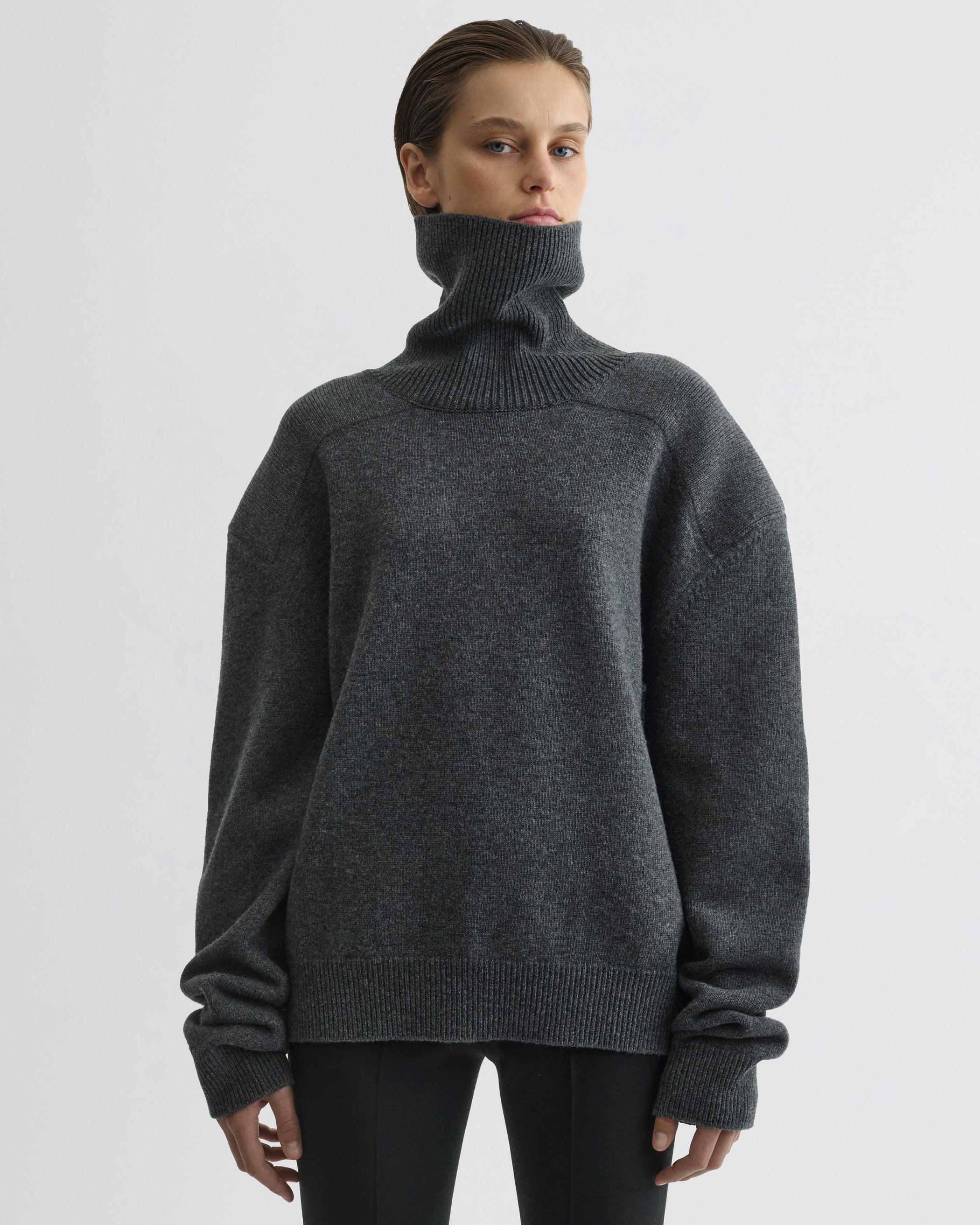 Front view of model wearing Patch Shoulder Jumper in grey melange wool cashmere