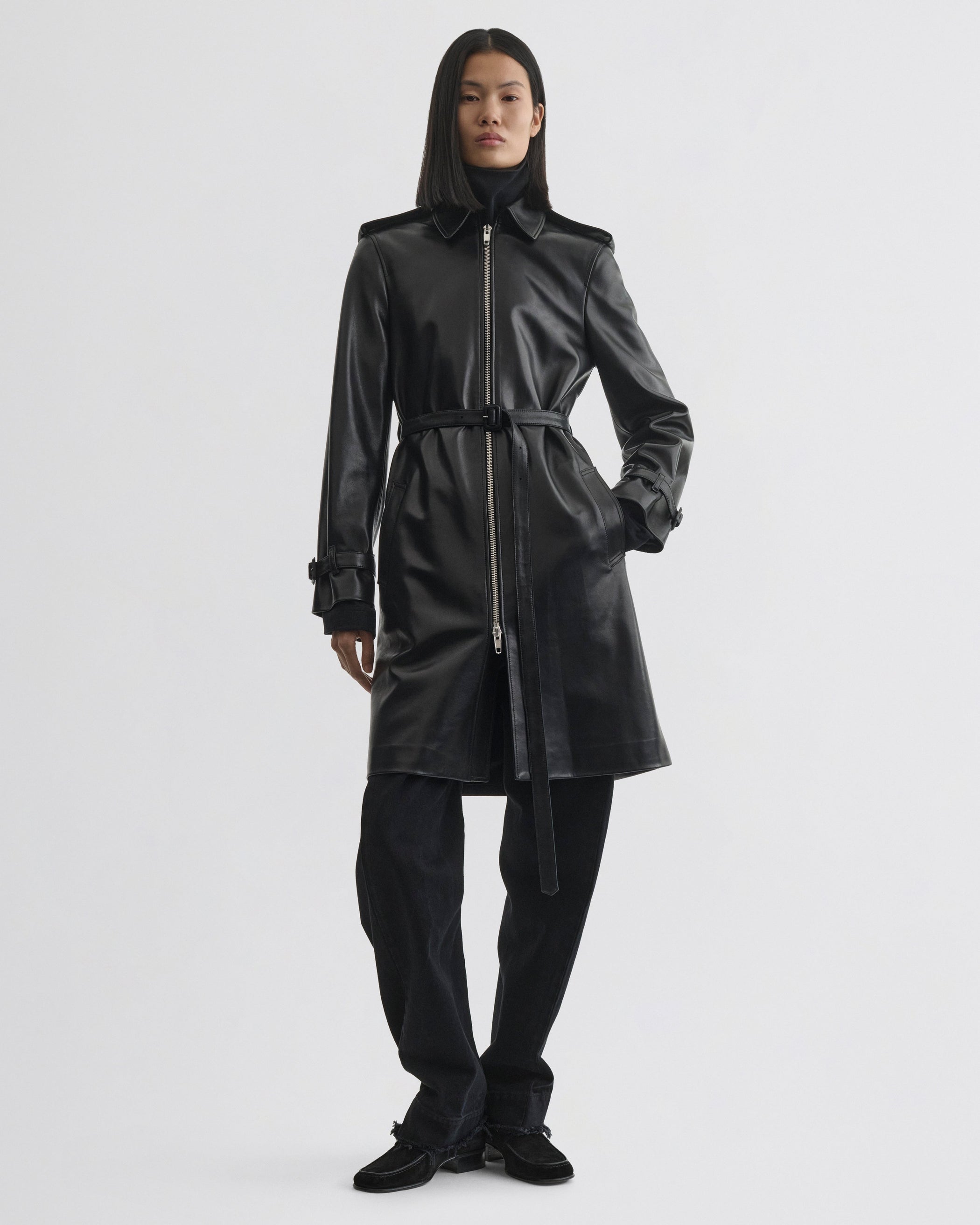 Front view of model wearing Short Trench in black leather