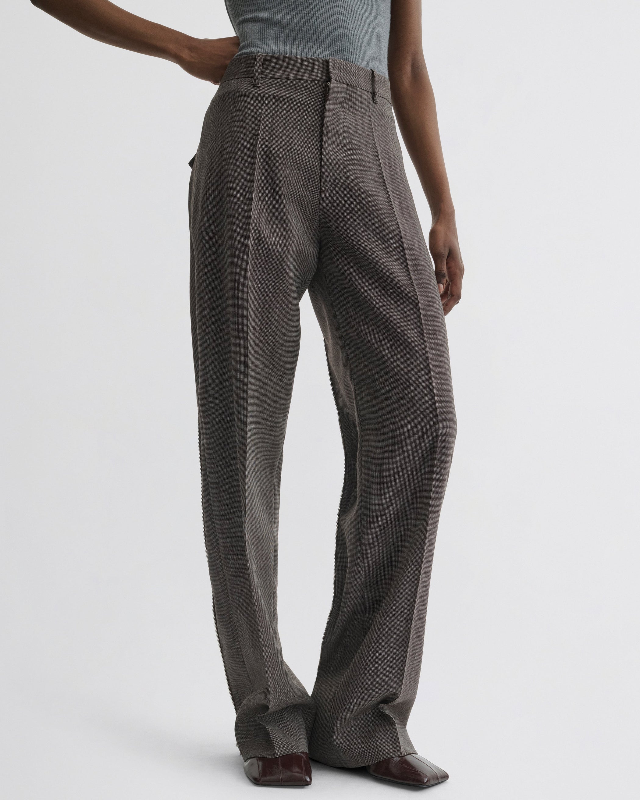 Front view of Split Zip Trousers in white dark brown wool