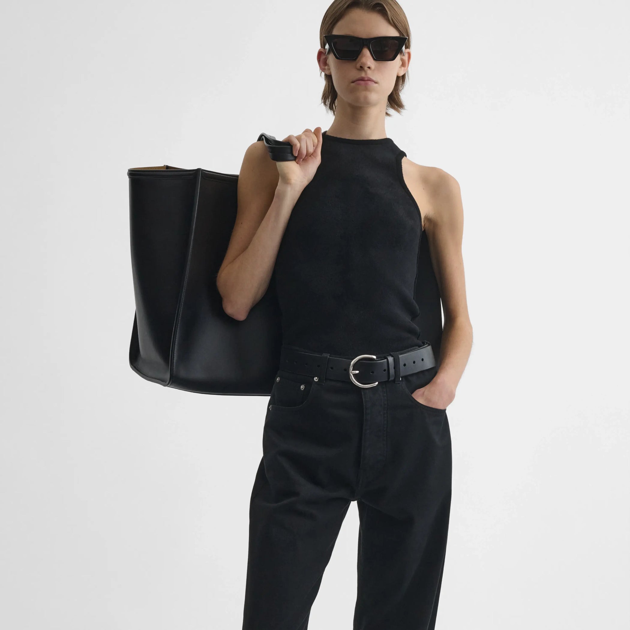 Model holding XL cabas in black leather
