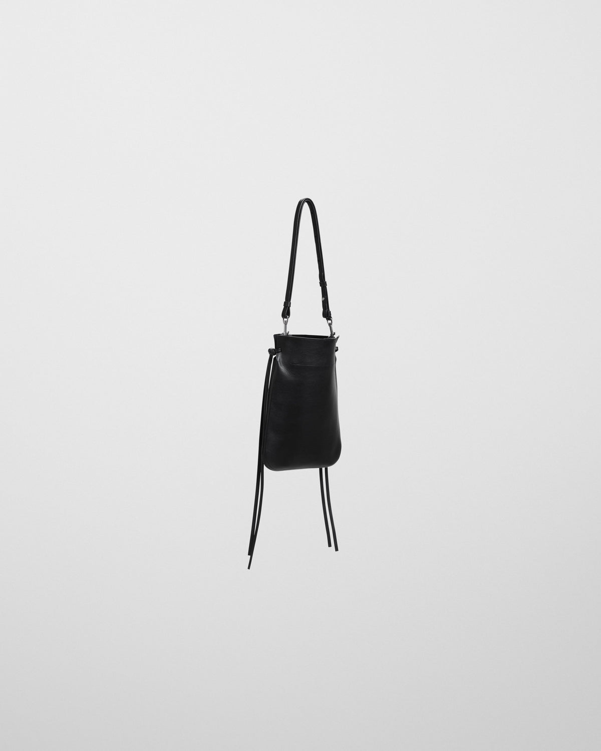 Side view of GIG POUCH in black leather