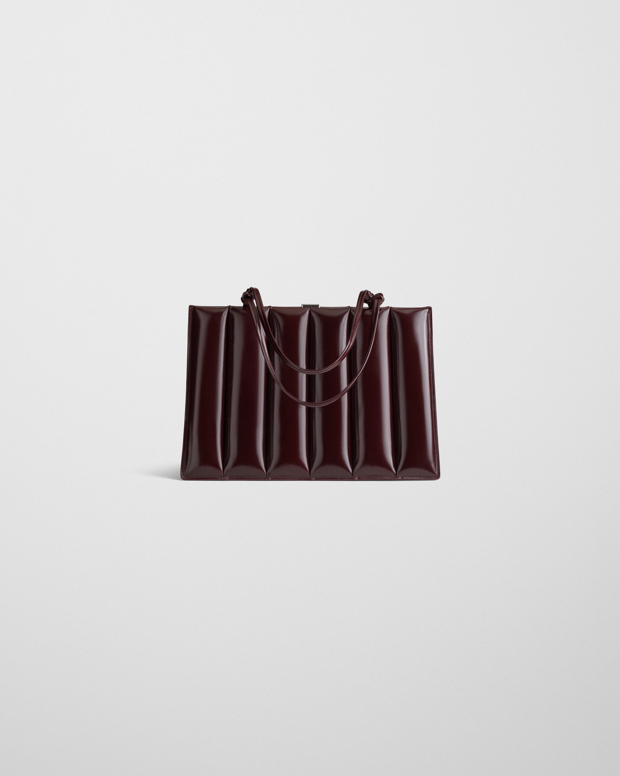 Flat front view image of the Drive Bag in Oxblood leather