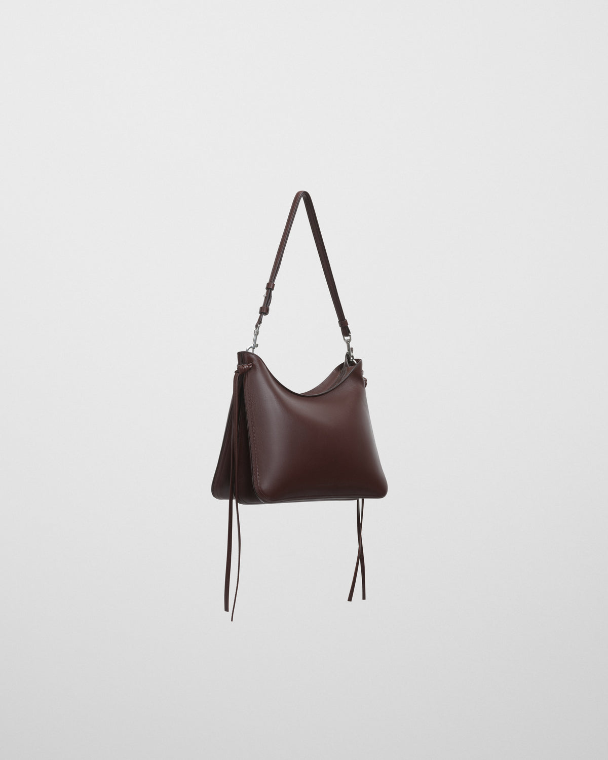 Angled front view of GIG BAG in cognac leather