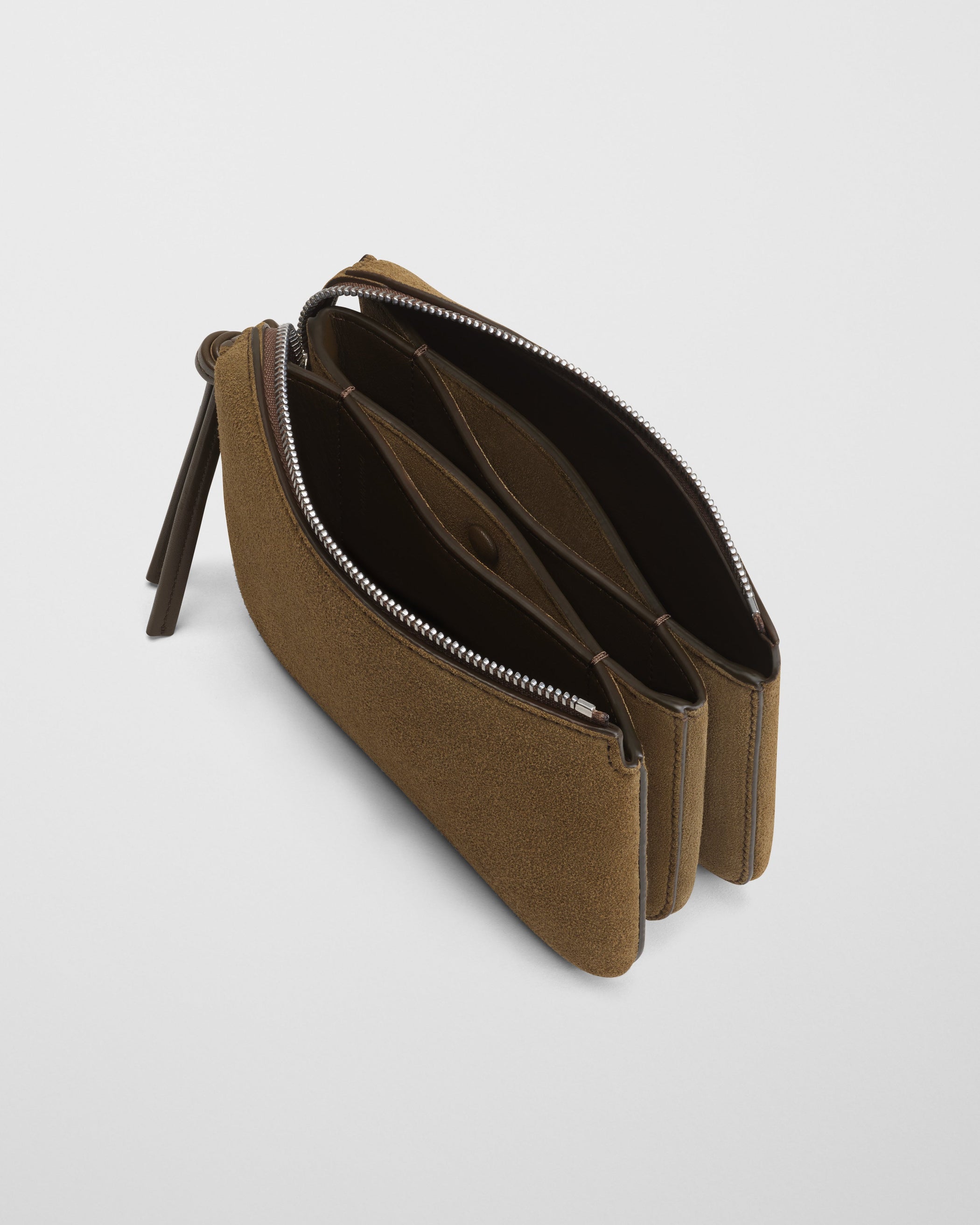 Detail open view of POCKET GIG in olive suede