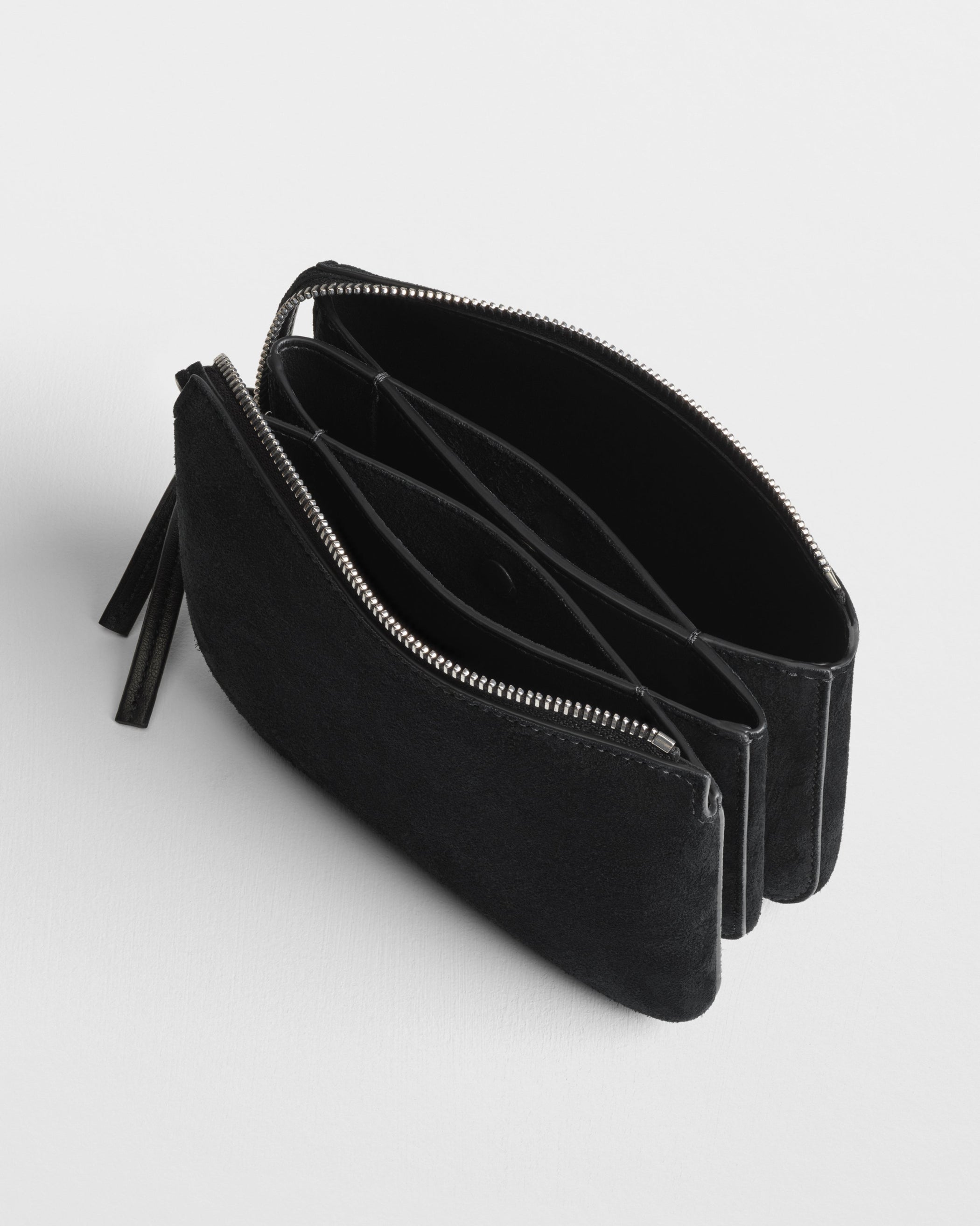 Close up detail view of POCKET GIG in black suede leather