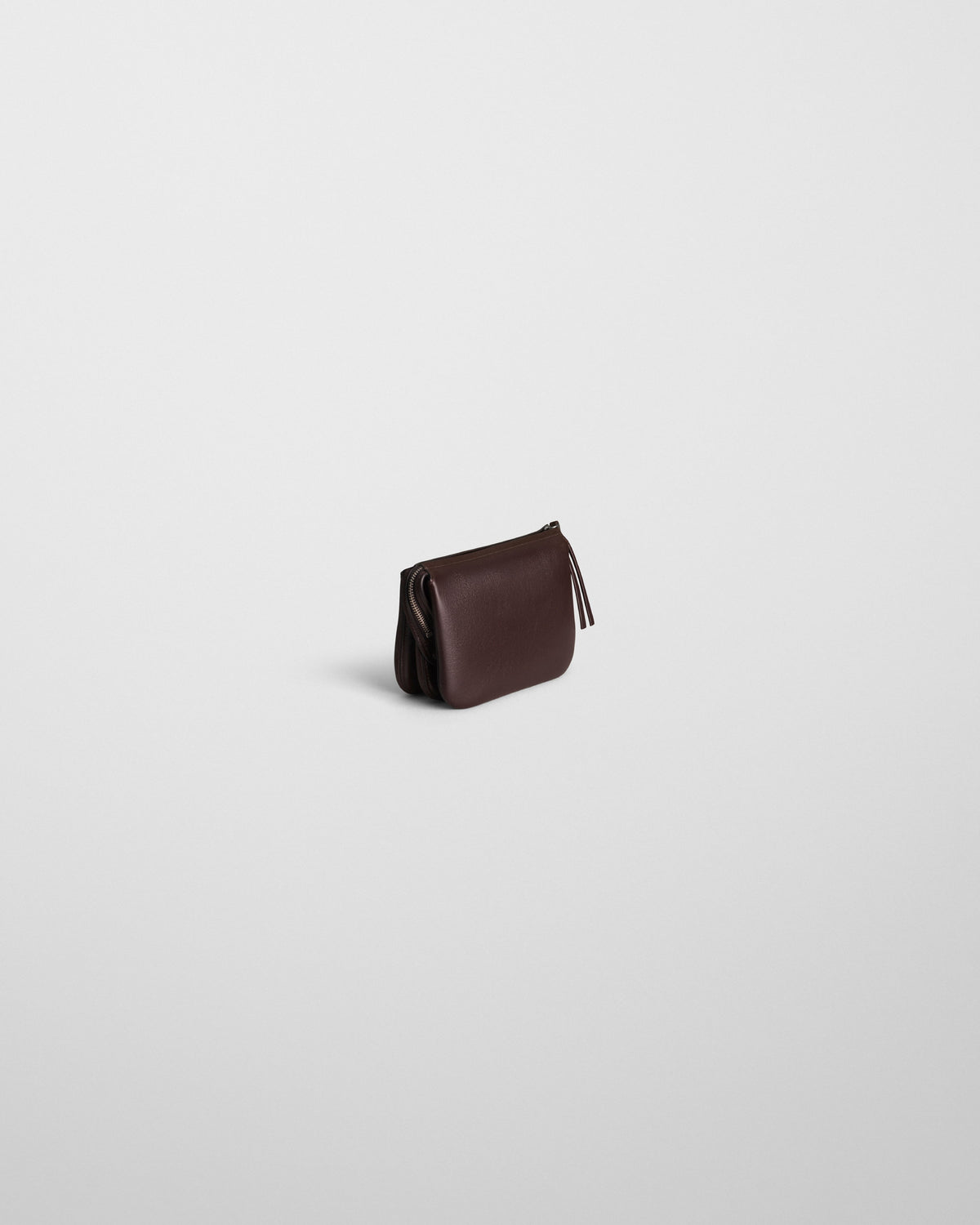 Side view of SMALL POCKET GIG in chocolate brown leather