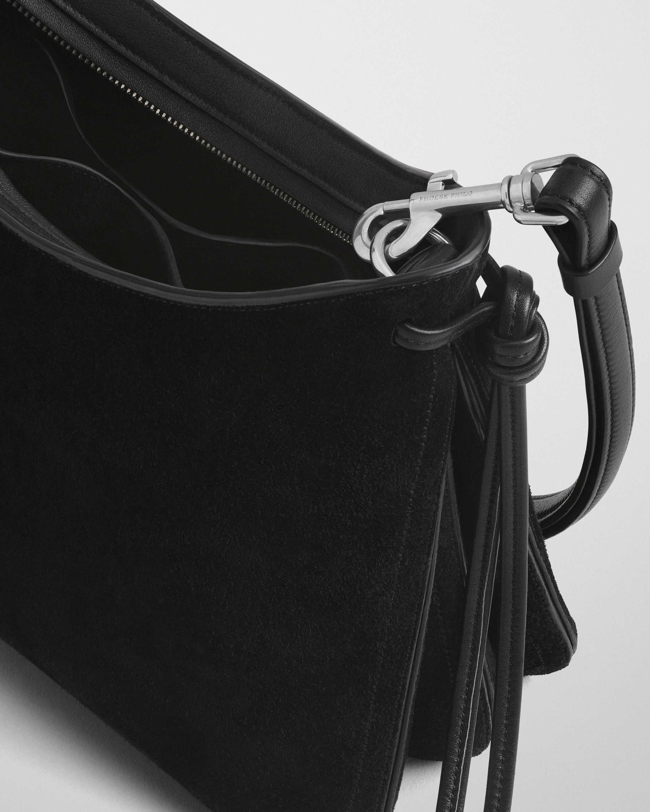 Detail view of SMALL GIG BAG in black suede