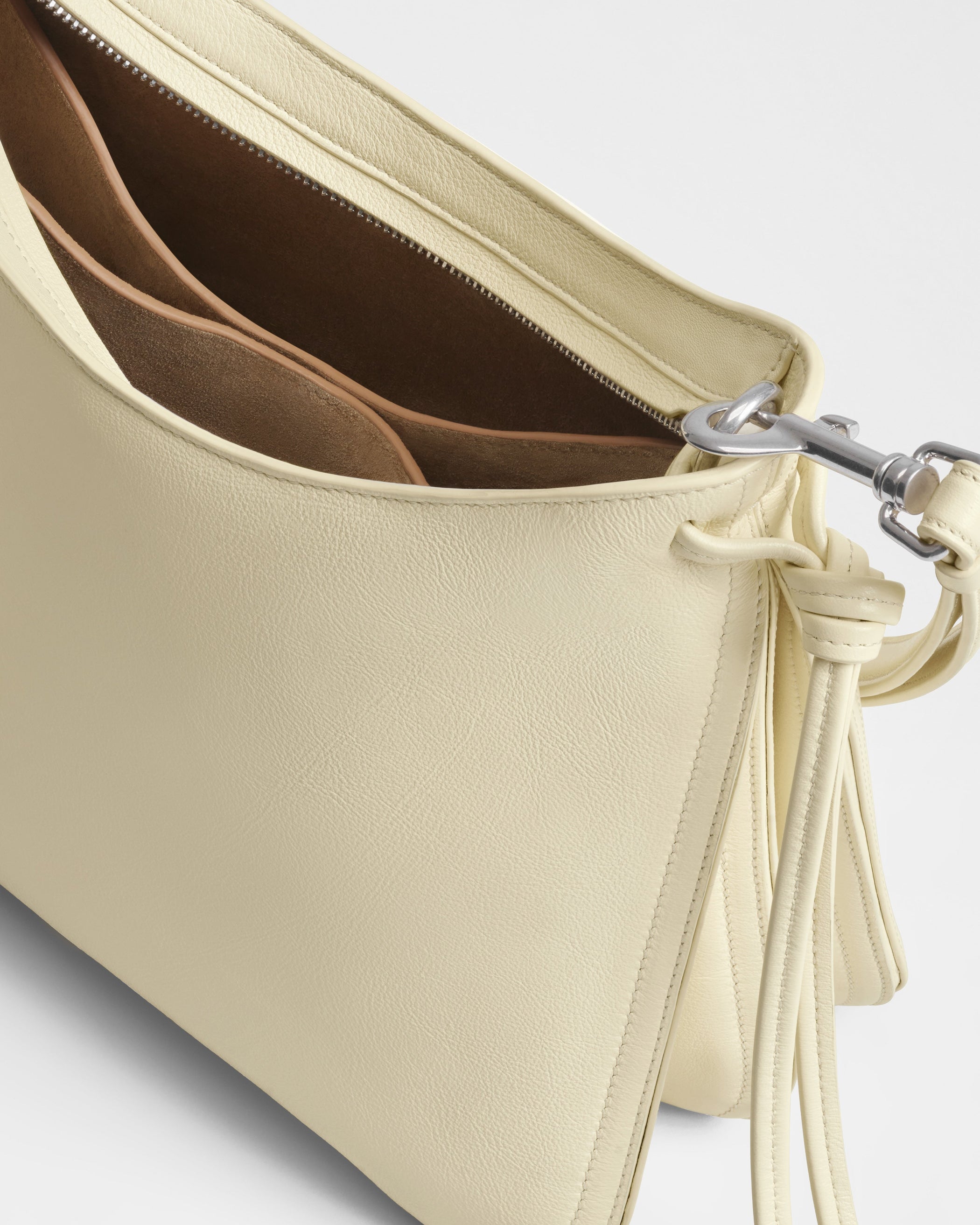 Detail view of SMALL GIG BAG in stucco leather