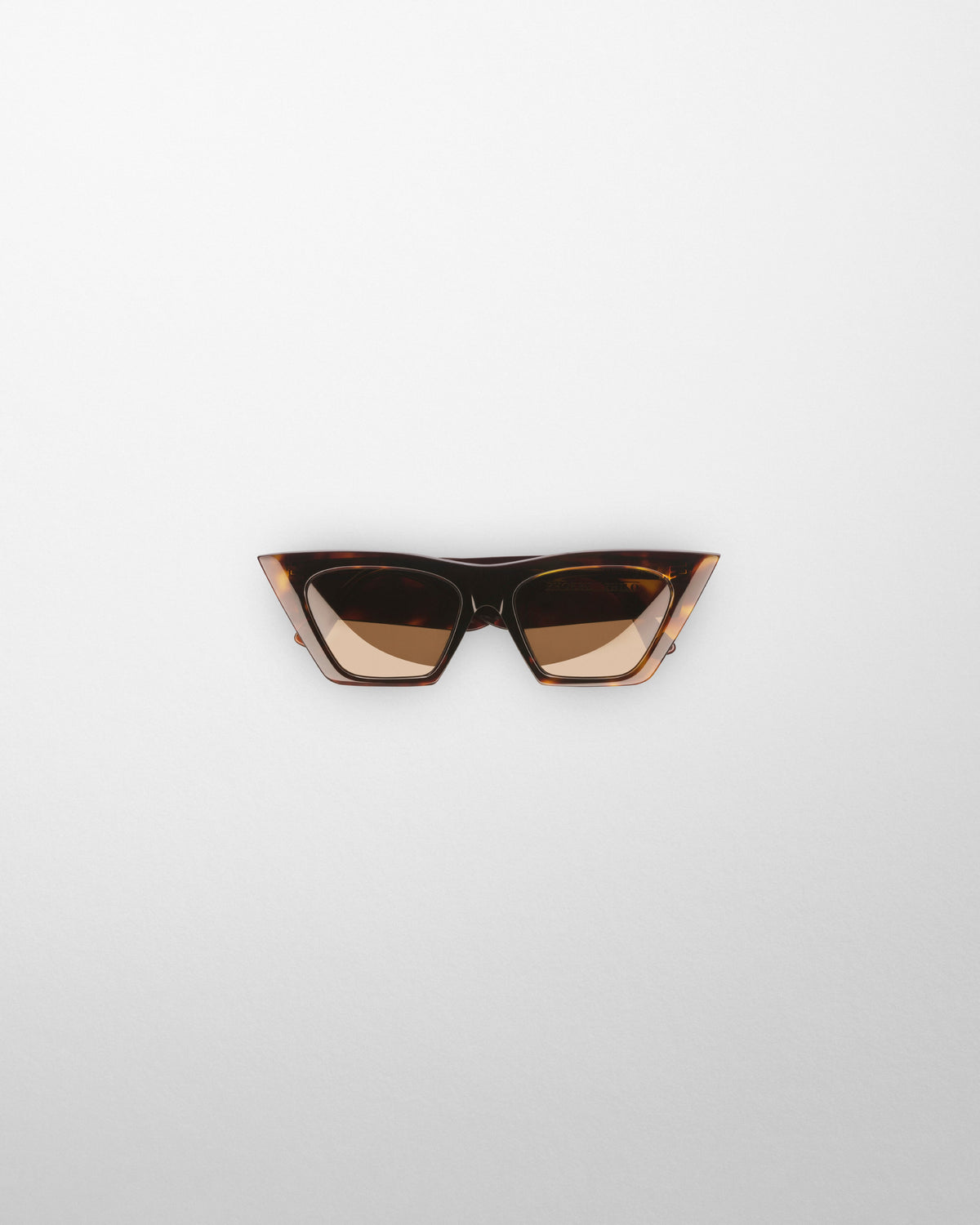 Front view of PEAK SUNGLASSES in cognac tortoiseshell acetate