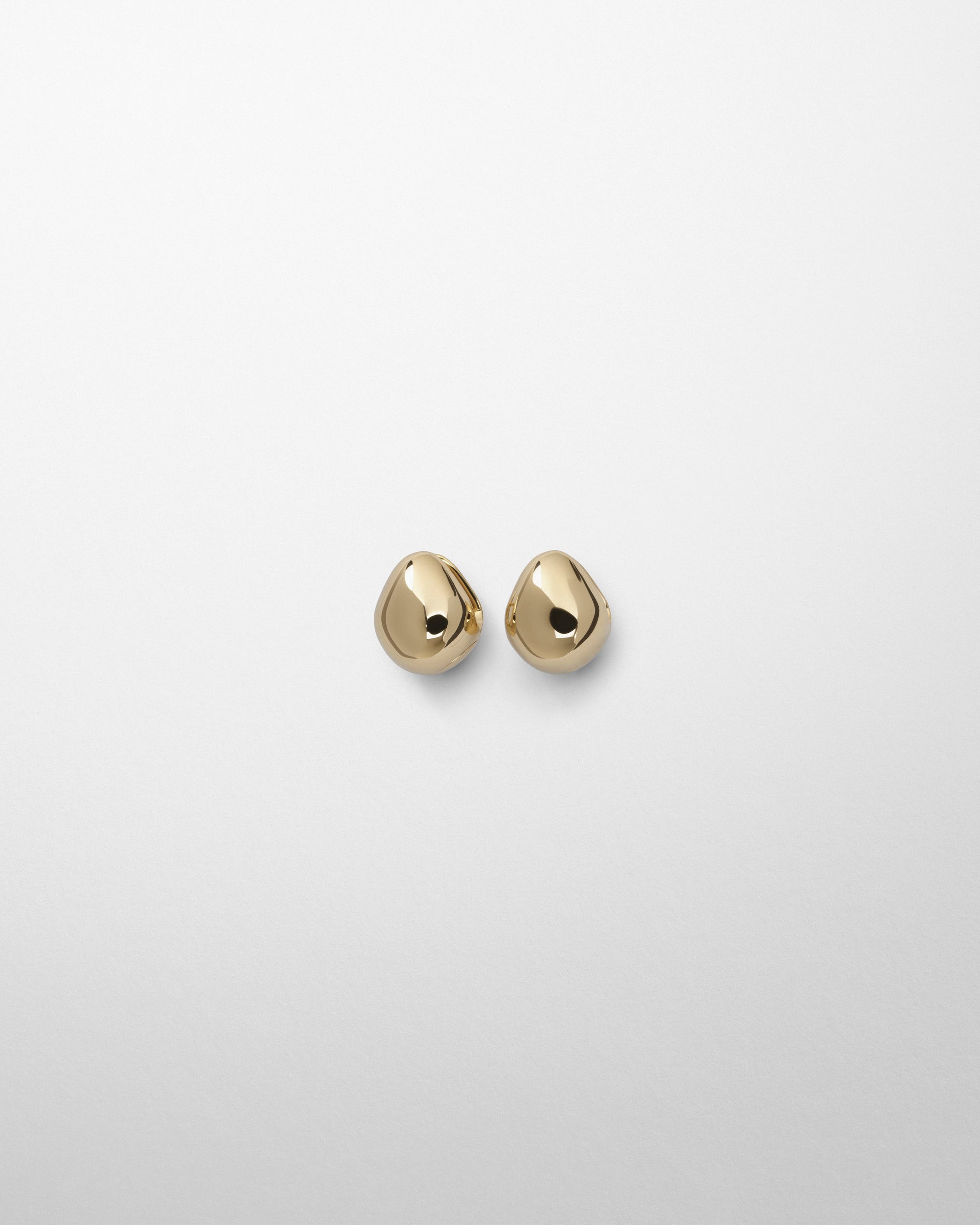 Flat front view of PEBBLE STUD EARRINGS in gold