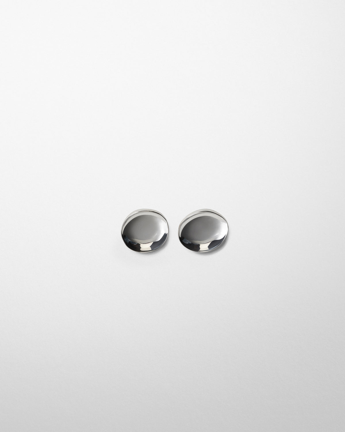 Flat front view of MEDALLION DISH EARRINGS in sterling silver