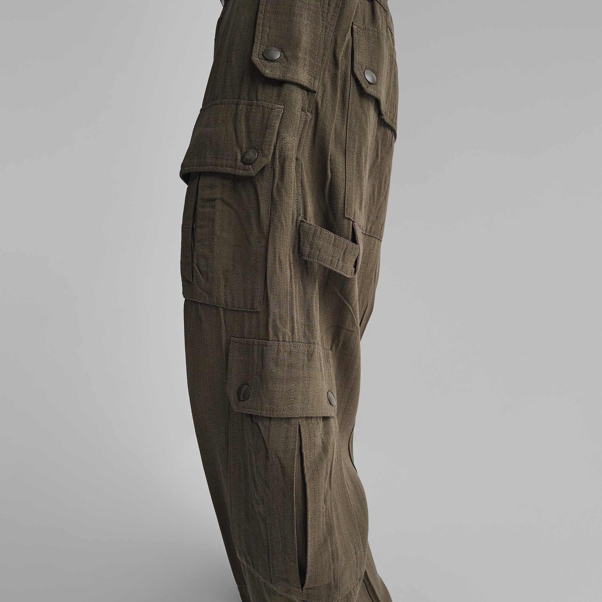 Side view of model wearing PATCH POCKET CARGO TROUSERS in shroom