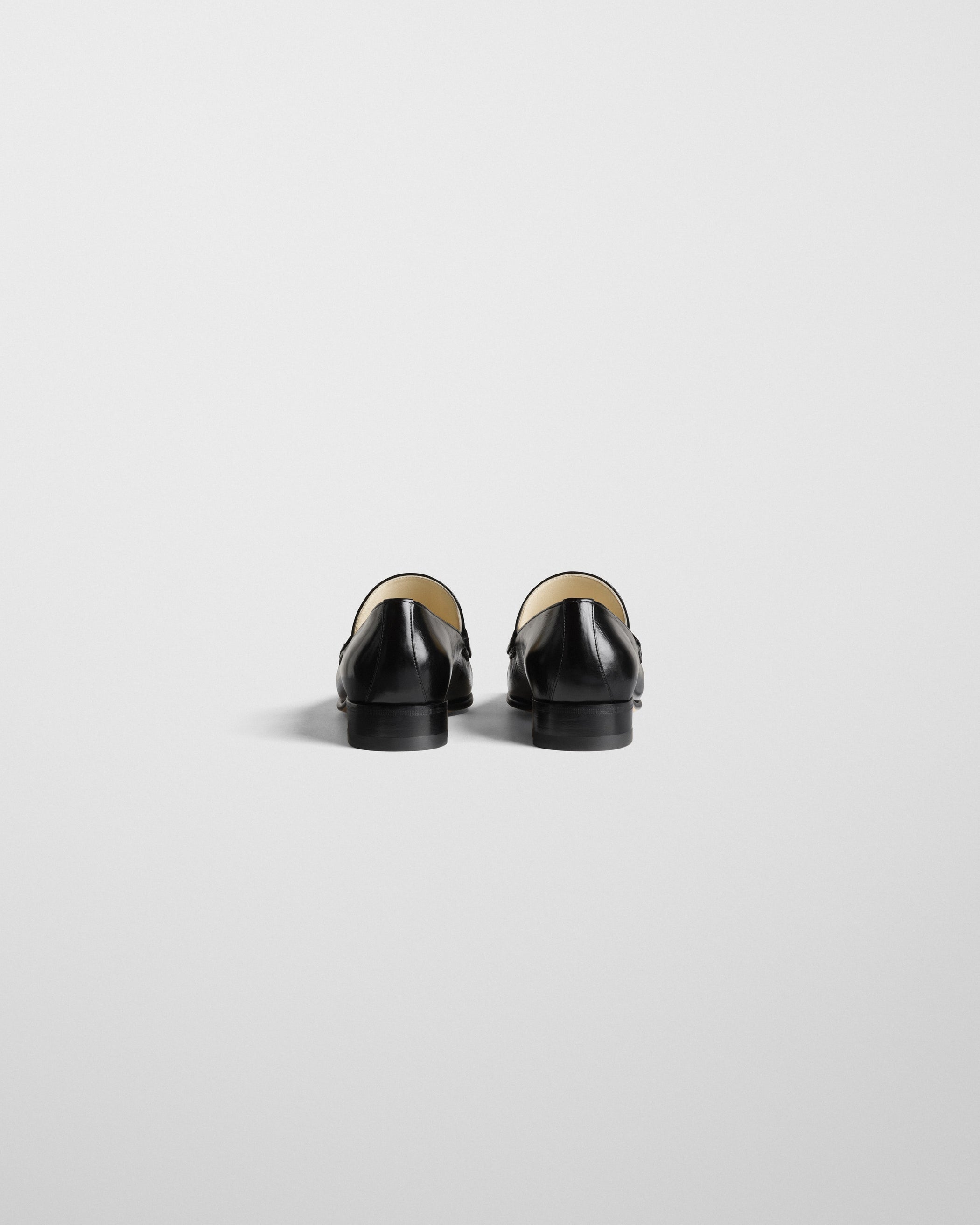 Back view of MAN’S LOAFER in black leather