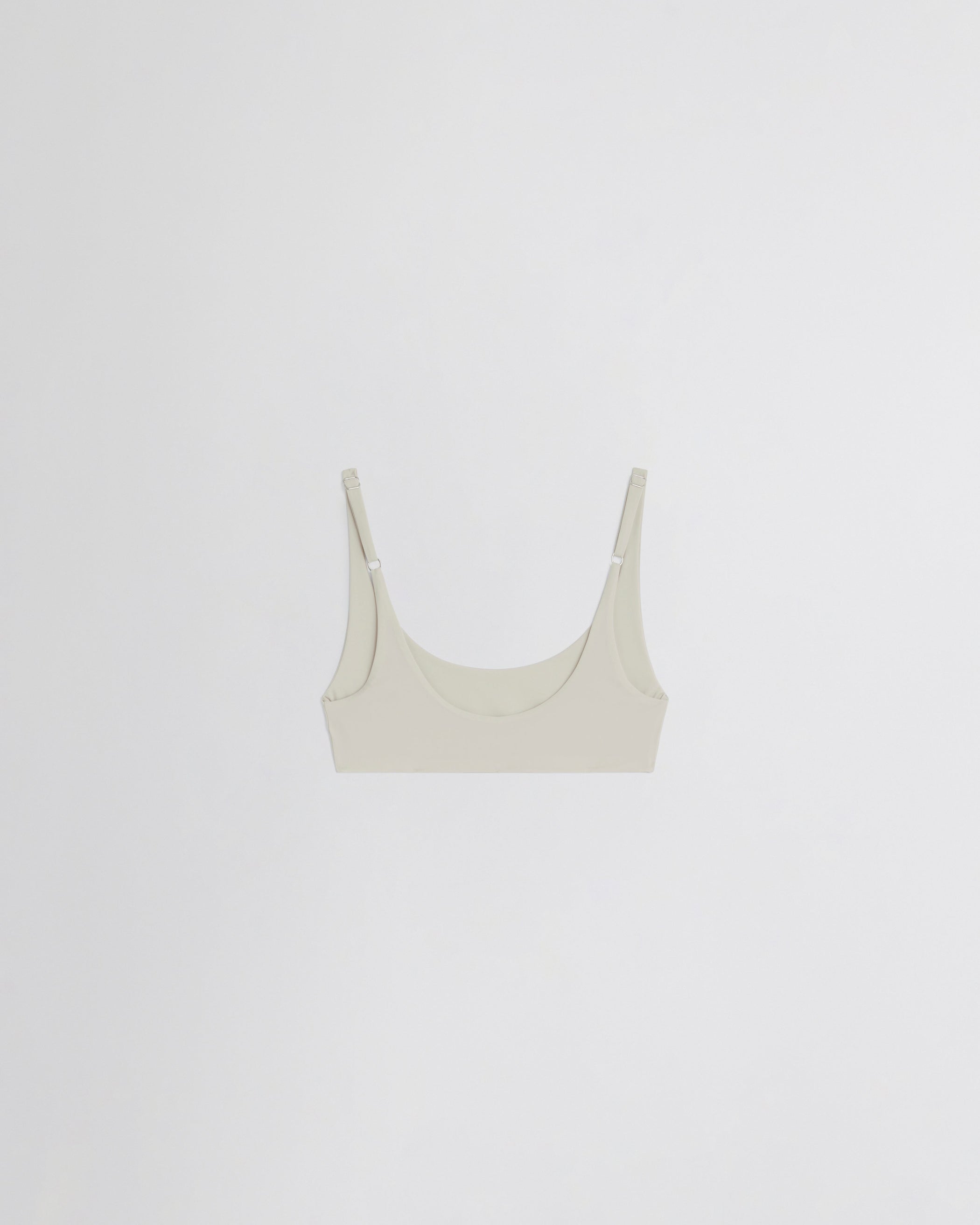 Flat back view of SCOOP BIKINI TOP in stucco polyamide
