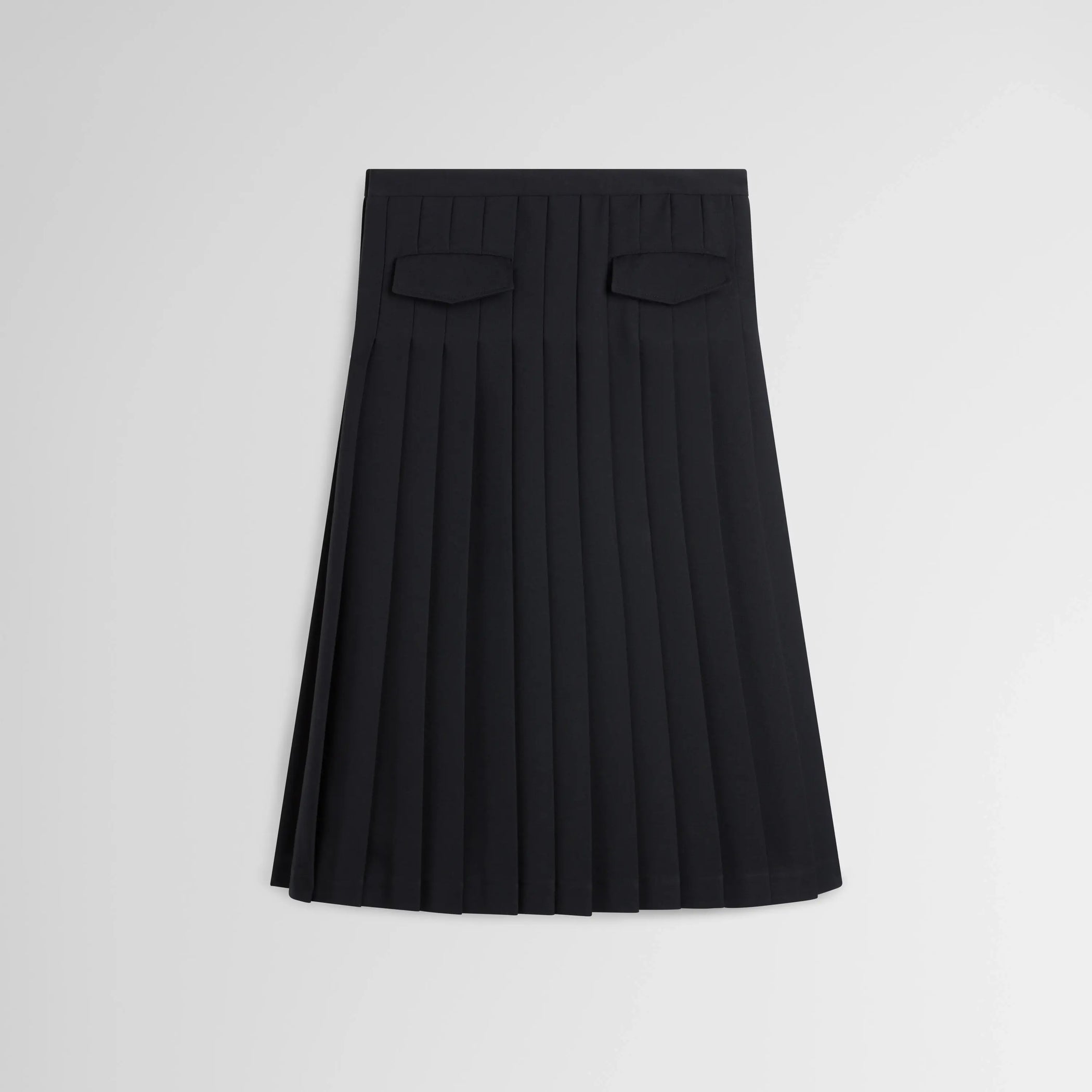 Flat back view of UNIFORM PLEATED SKIRT in black wool blend