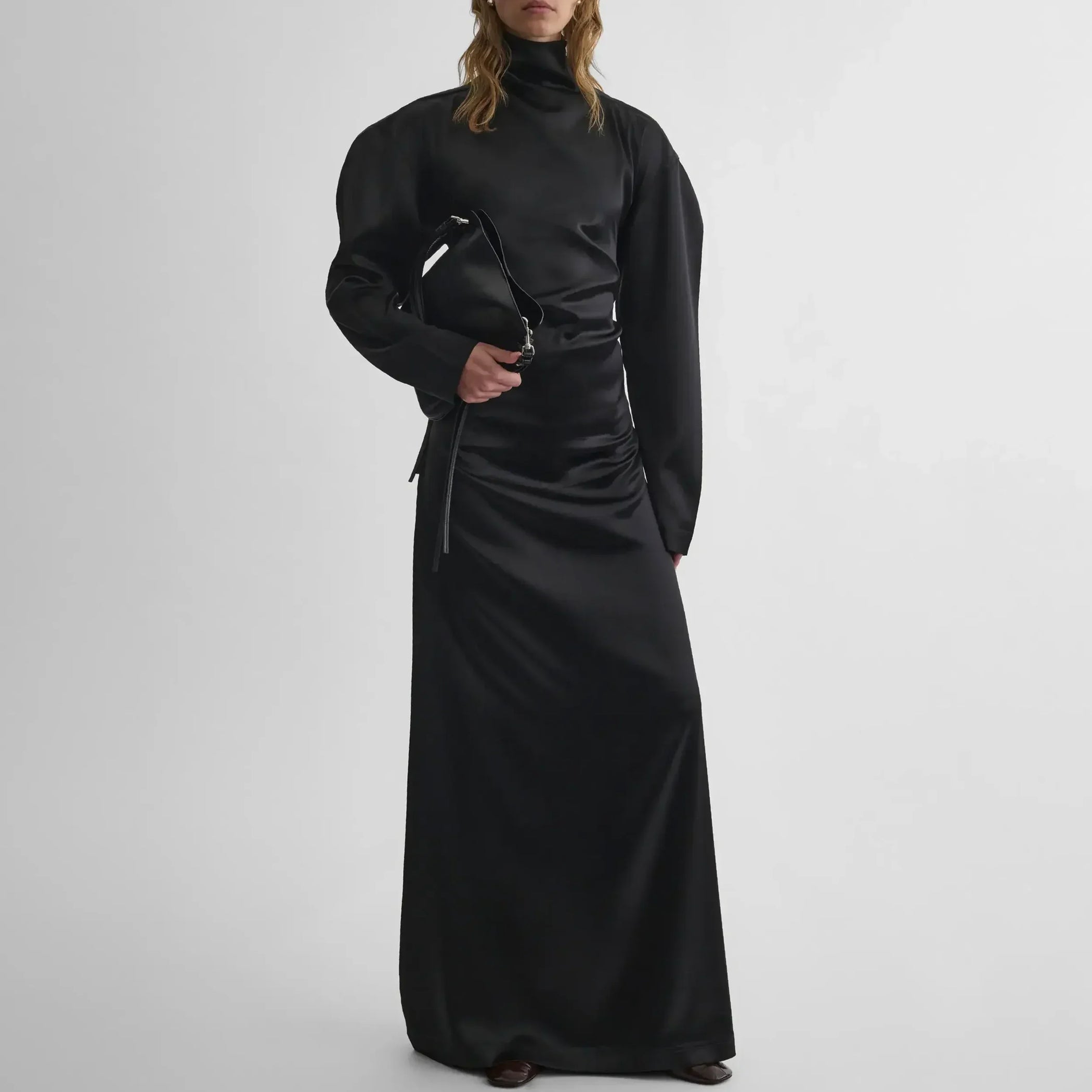 Front view of model wearing LIQUID OPEN BACK DRESS in black silk satin