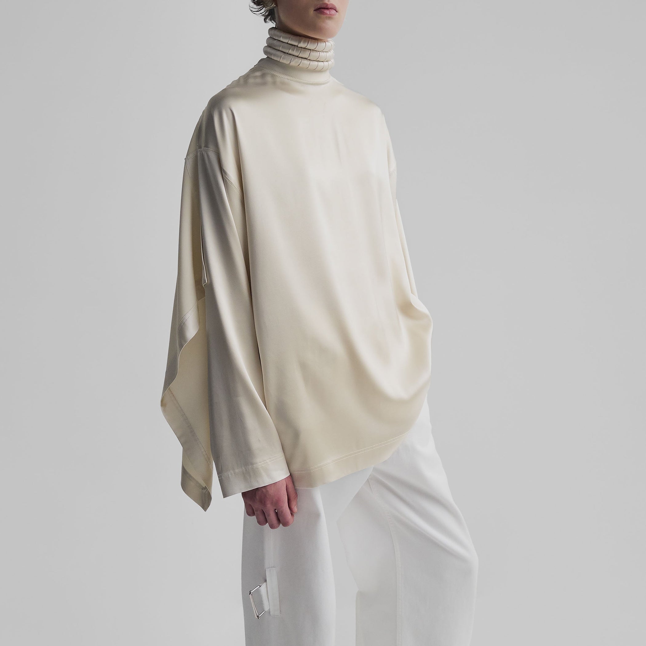 Front view of model wearing SCARF TOP in stucco silk satin