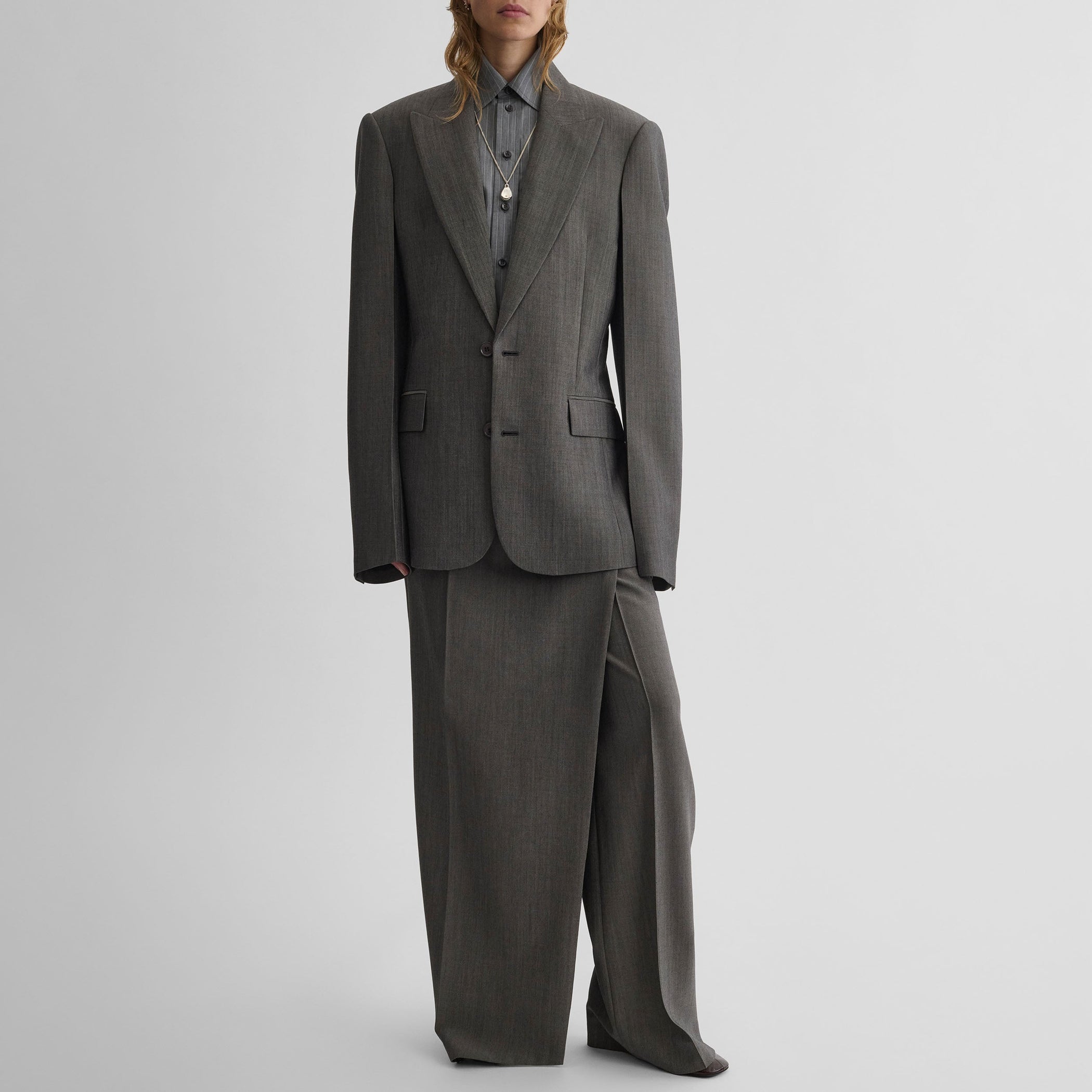 Front view of model wearing SINGLE BREASTED JACKET in dark taupe wool