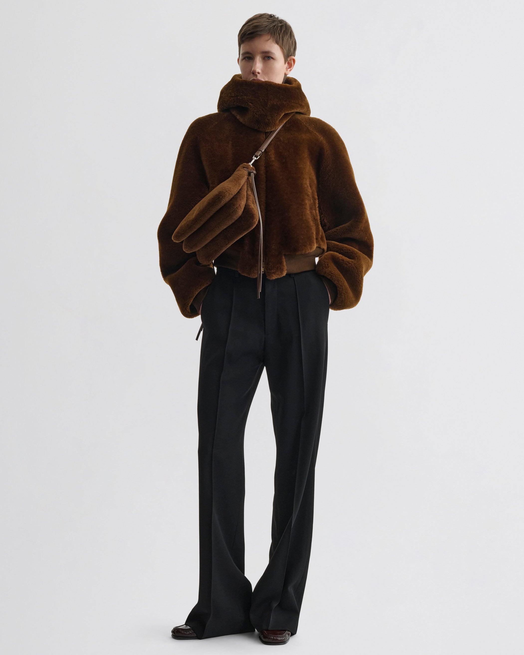 Full view of model wearing Super Soft Bomber Jacket in ginger shearling