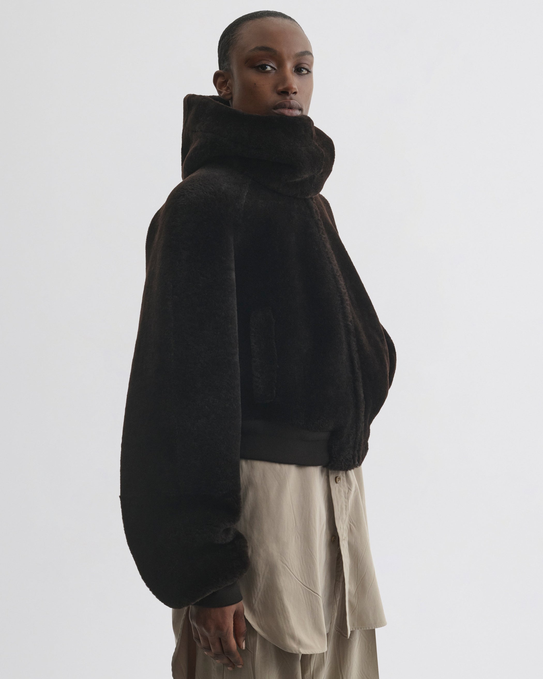 Side view of Super Soft Bomber Jacket in deep brown shearling