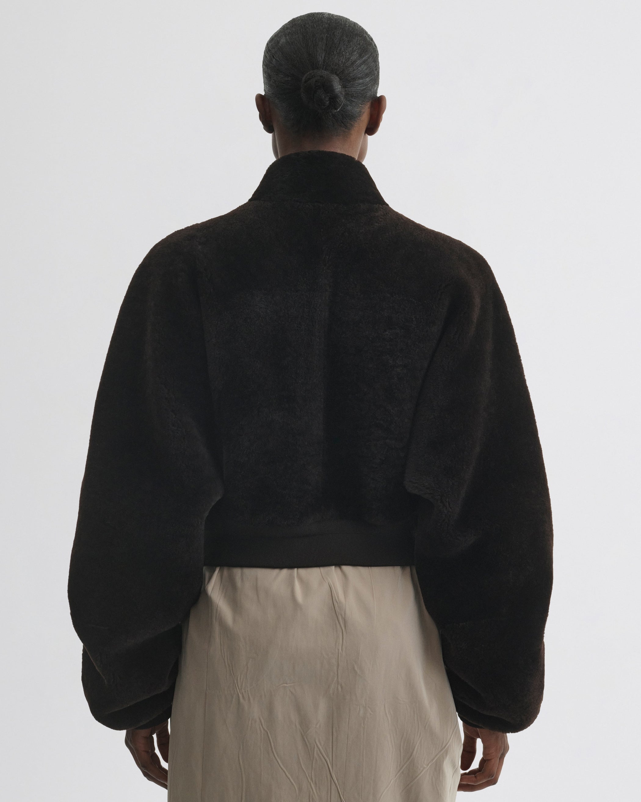 Back view of Super Soft Bomber Jacket in deep brown shearling