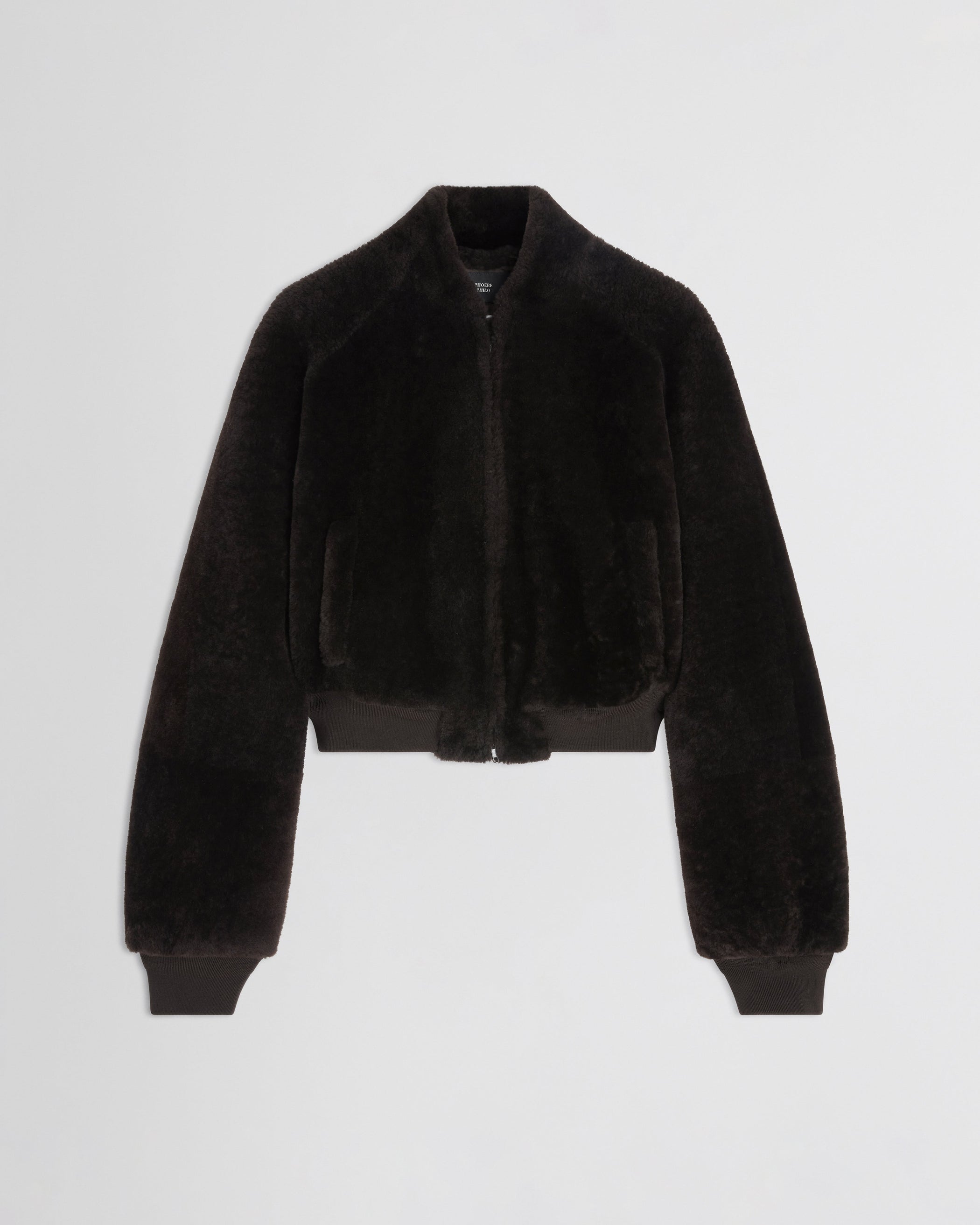 Flat front view of Super Soft Bomber Jacket in deep brown shearling