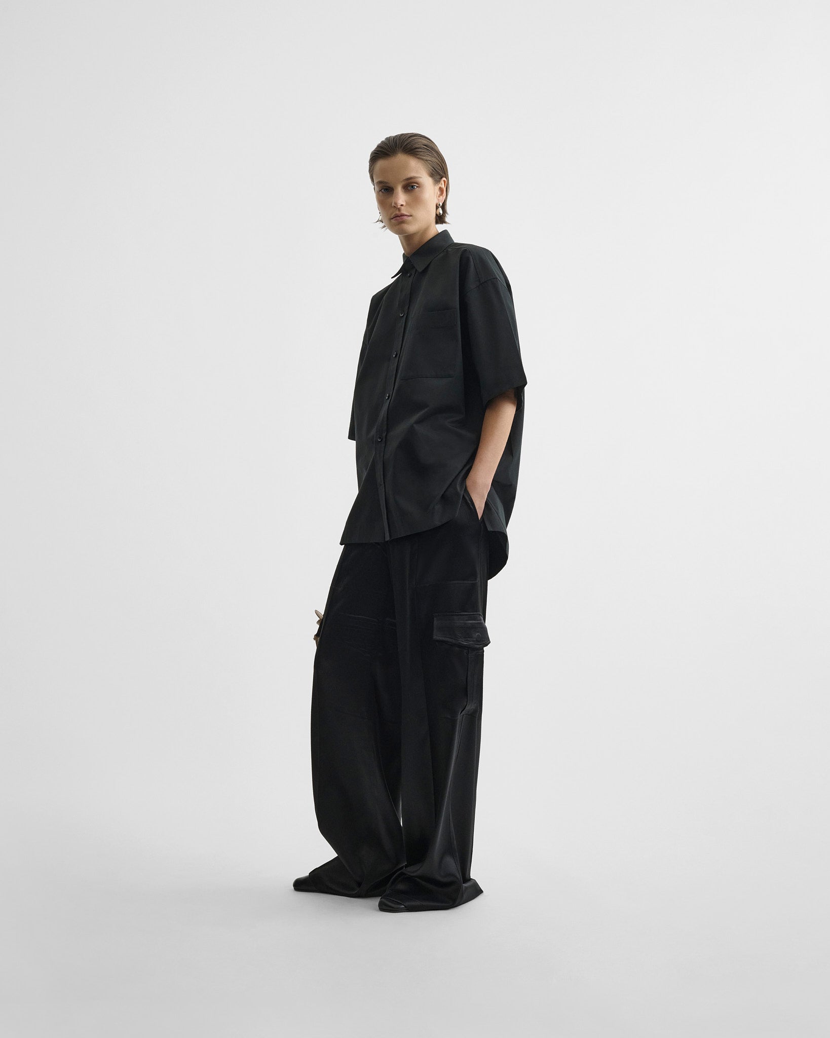 Front view of short sleeve shirt in black cotton