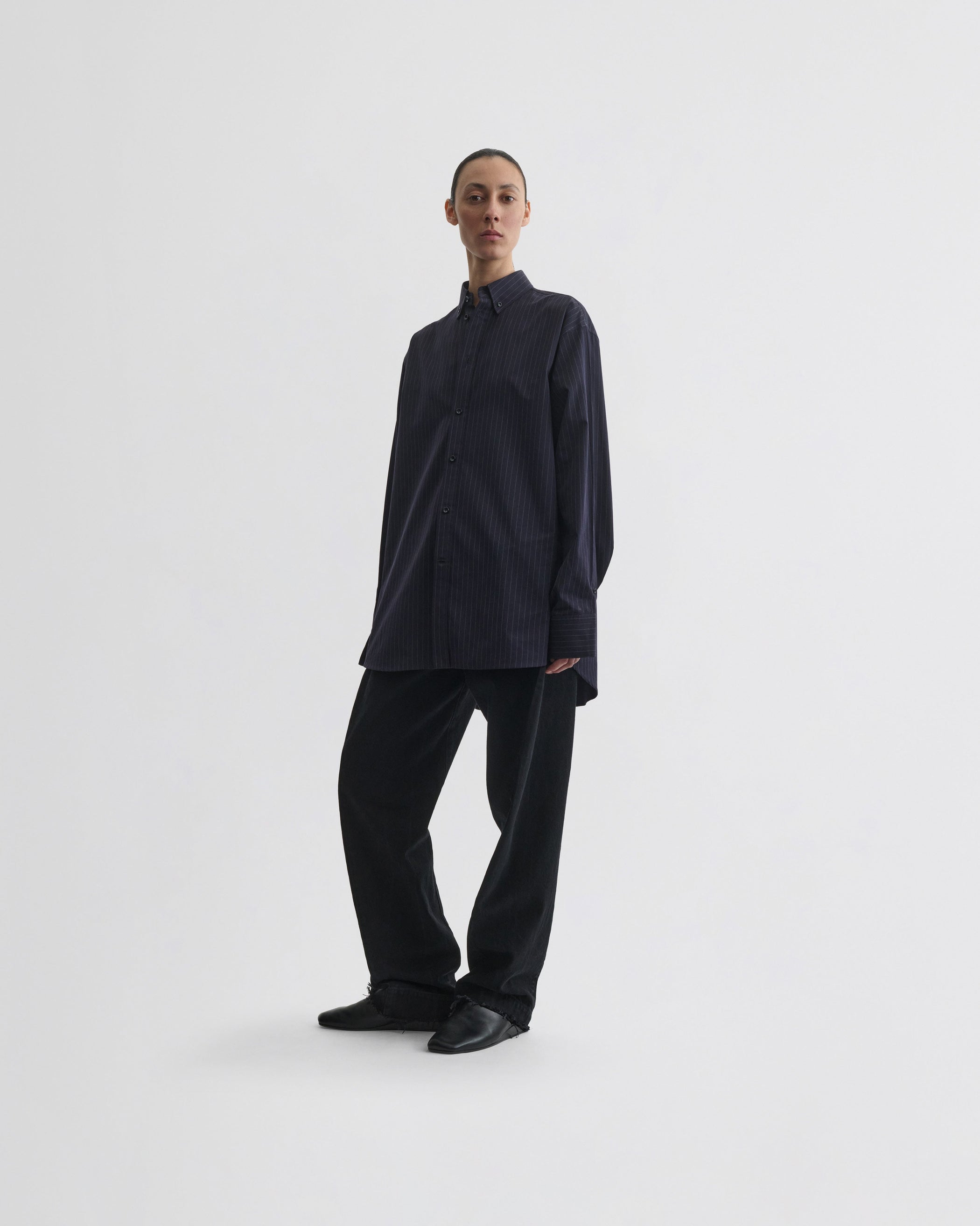 View of button collar shirt in midnight pinstripe cotton