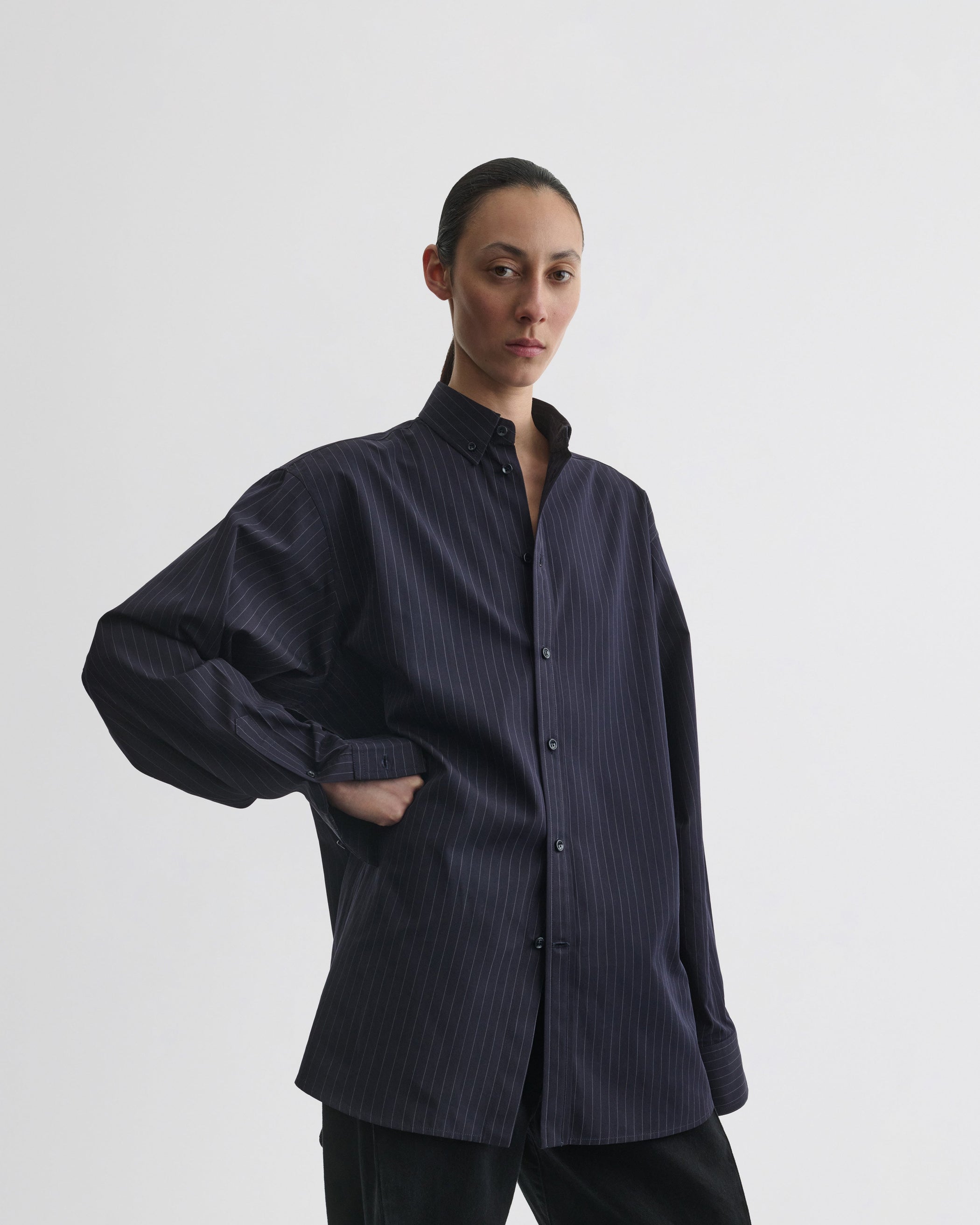 View of button collar shirt in midnight pinstripe cotton