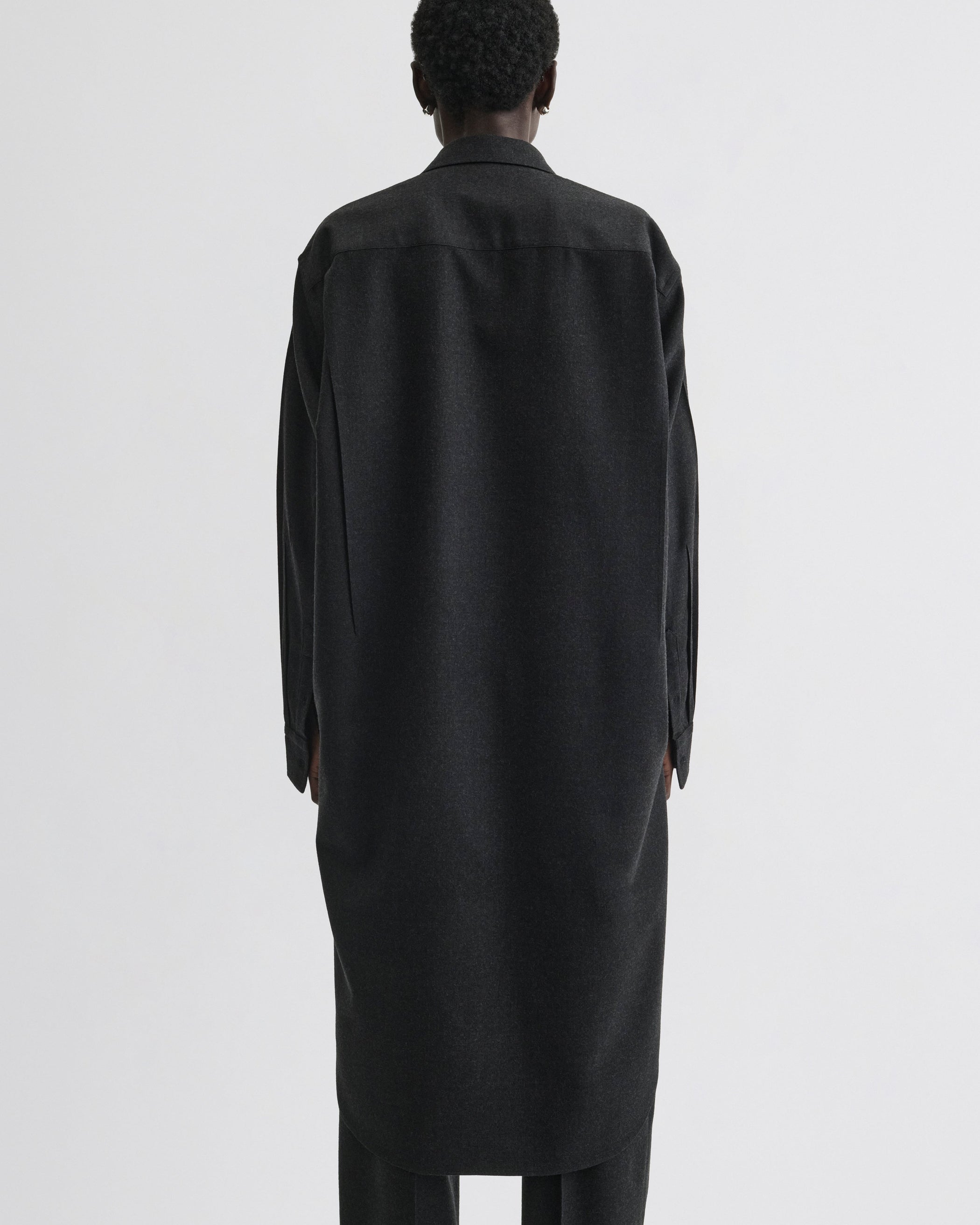 Back view of model wearing Elongated Shirt in charcoal wool