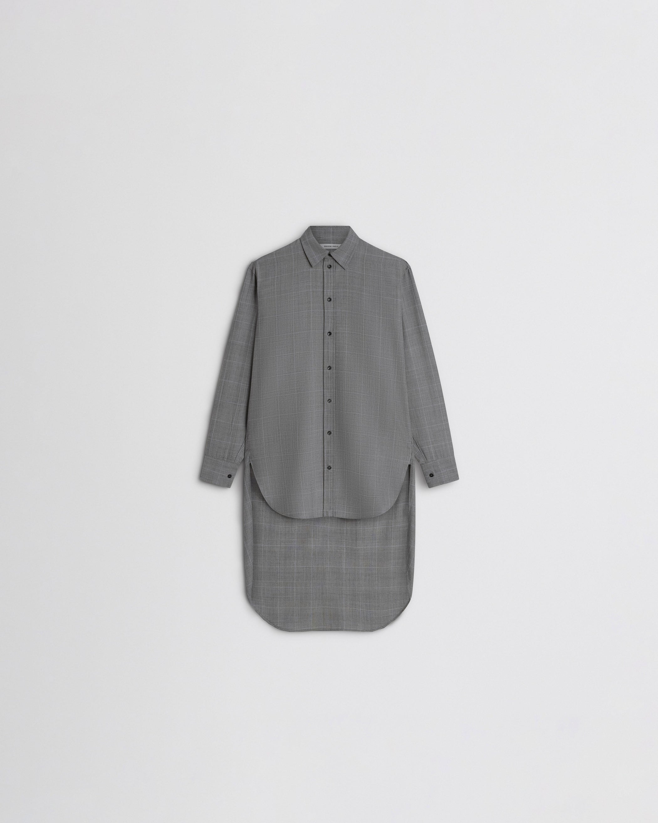 View of elongated shirt in black-blue wool