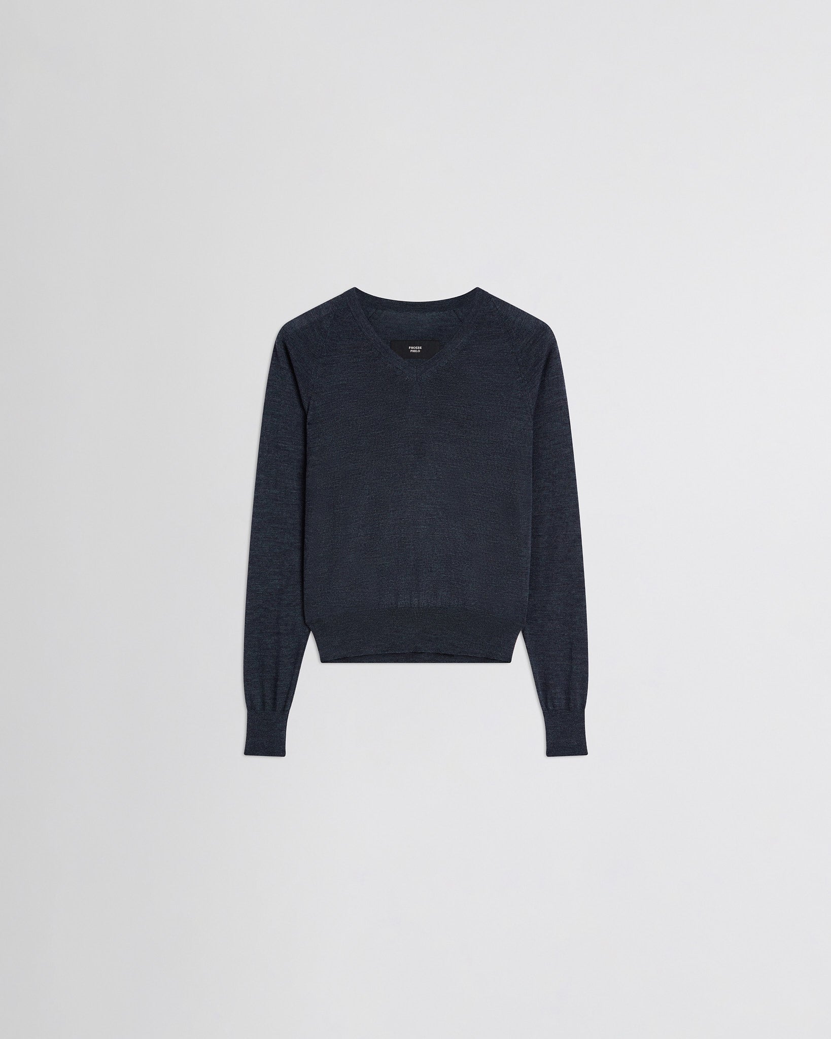 Flat front view of shrunk v-neck in dark blue melange wool