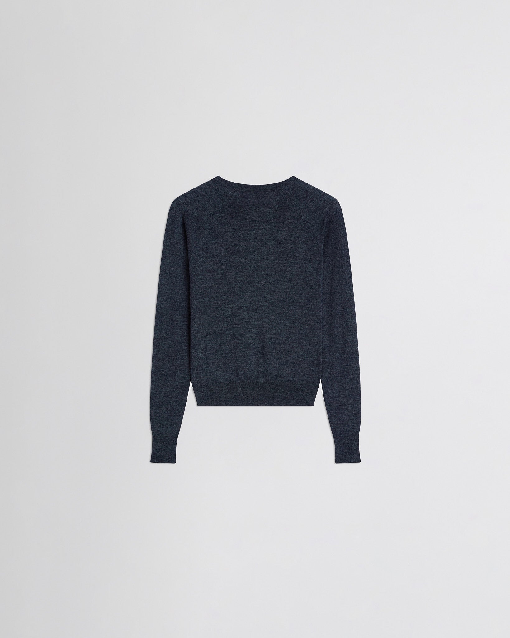 Flat back view of shrunk v-neck in dark blue melange wool.
