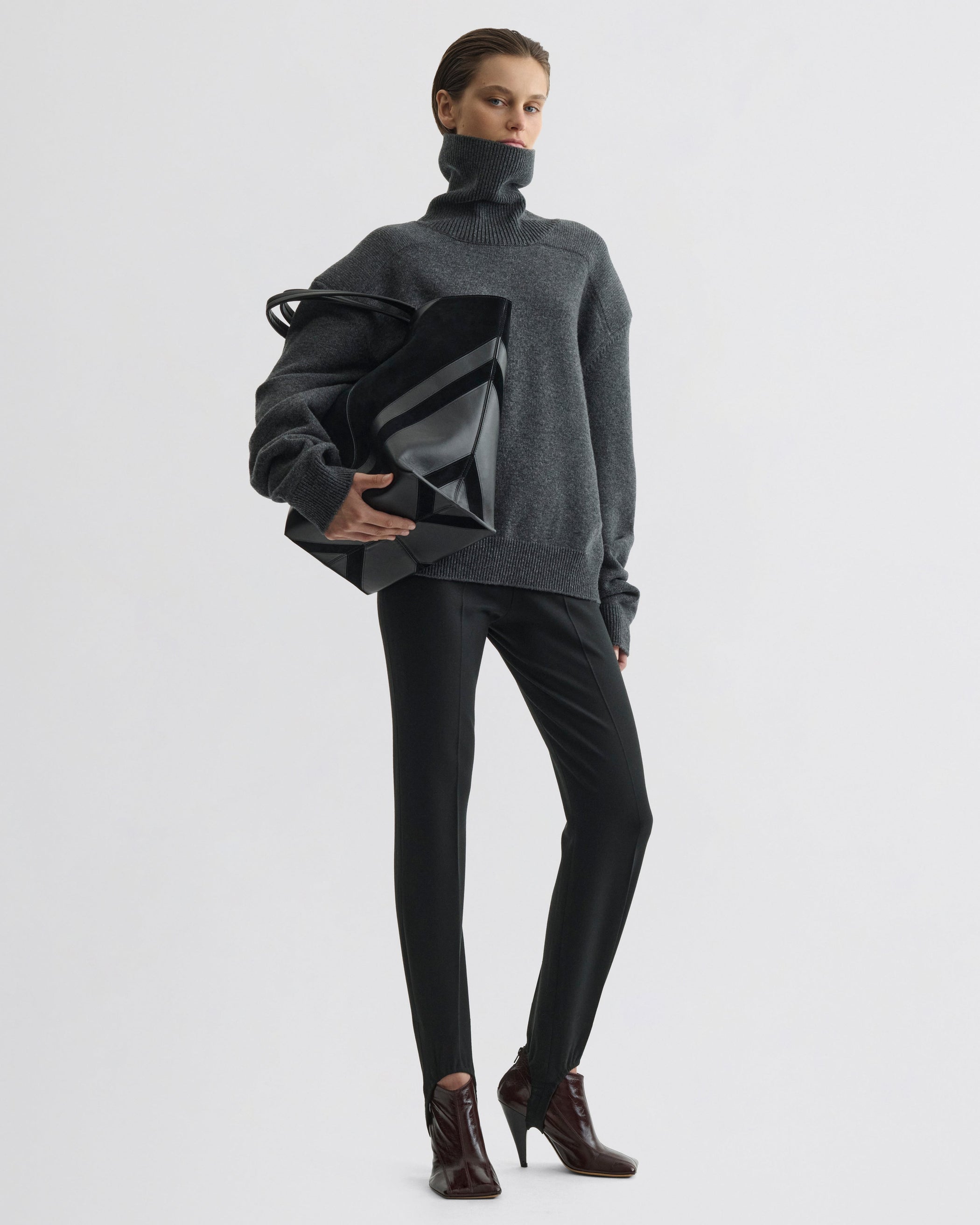 Full view of model wearing Patch Shoulder Jumper in grey melange wool cashmere