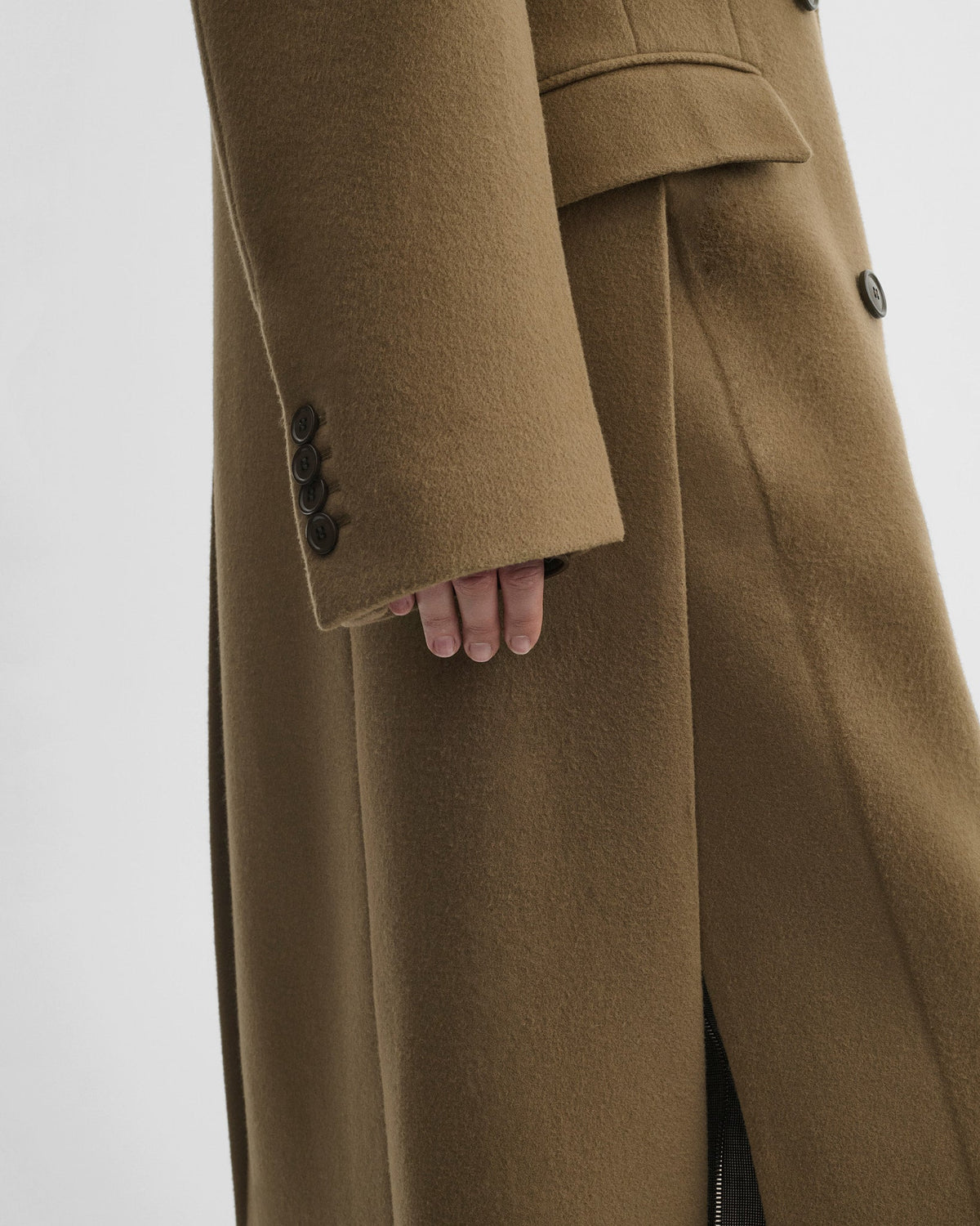 Detail view of model wearing MAN'S COAT in tobacco cashmere