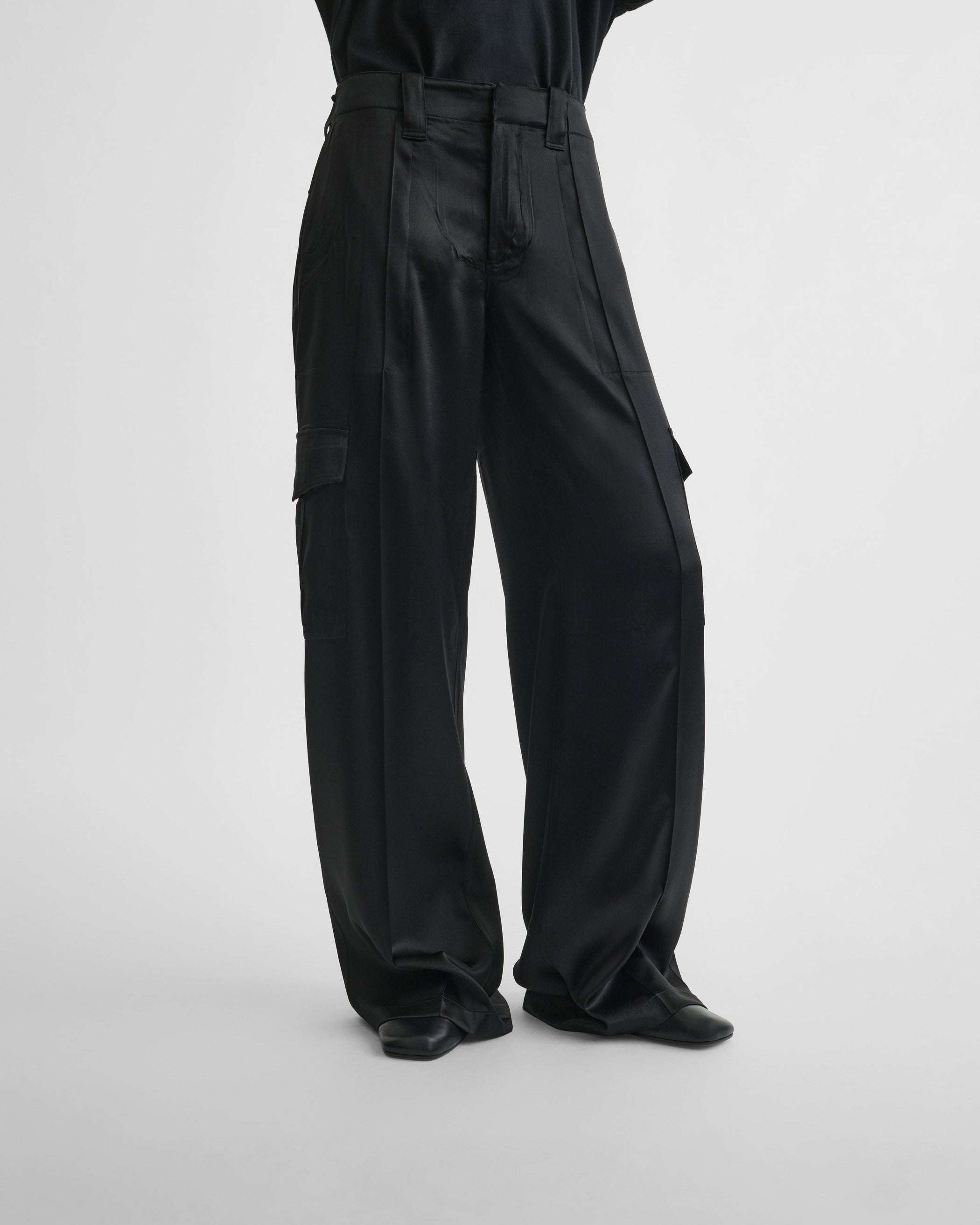 View of liquid cargo trousers in black silk