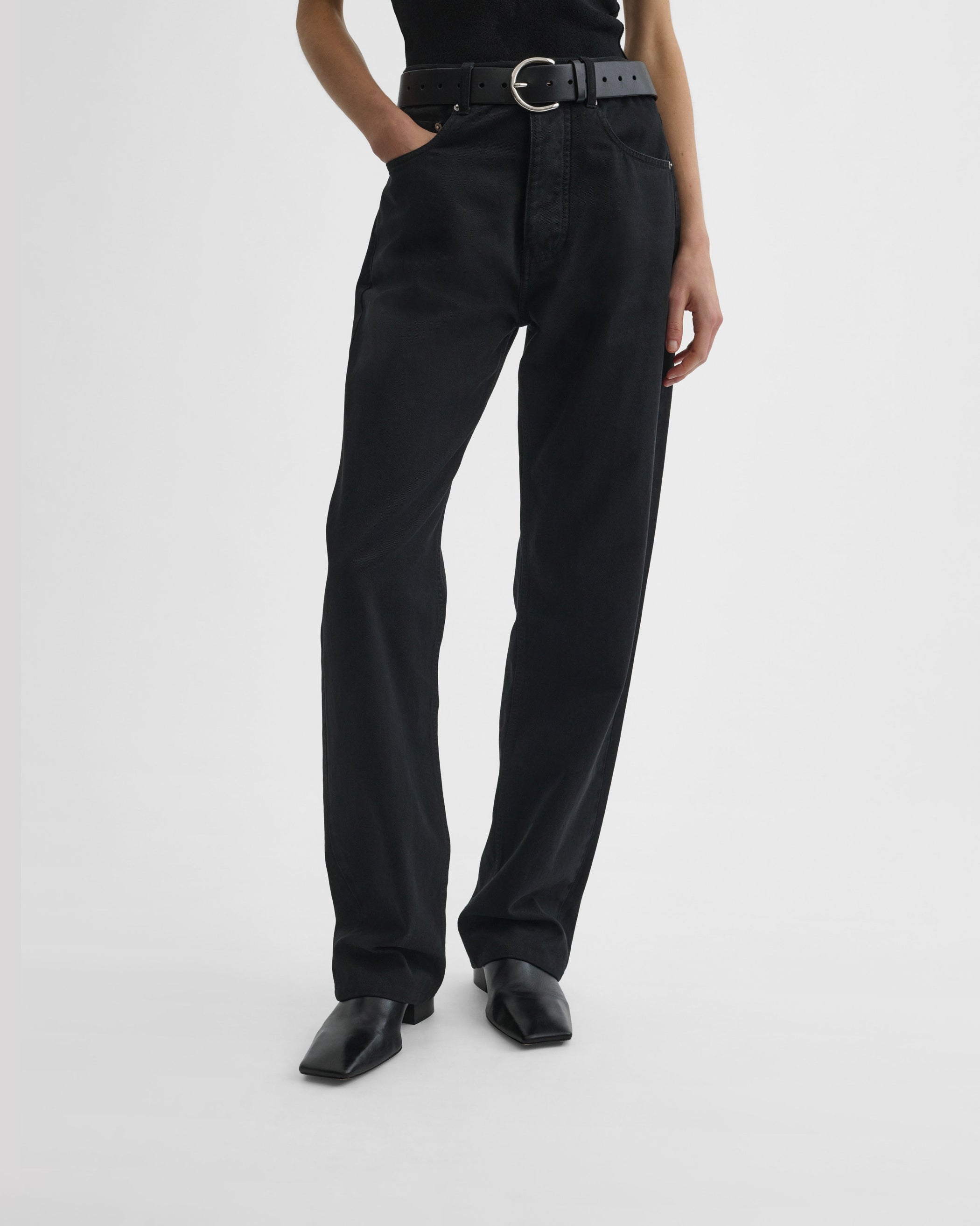 Front view of model wearing CLASSIC JEANS in black cotton