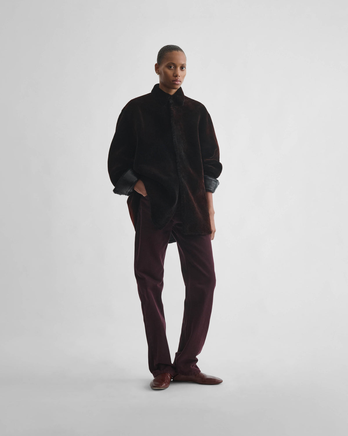 Front view of model wearing CLASSIC JEANS in dark berry cotton