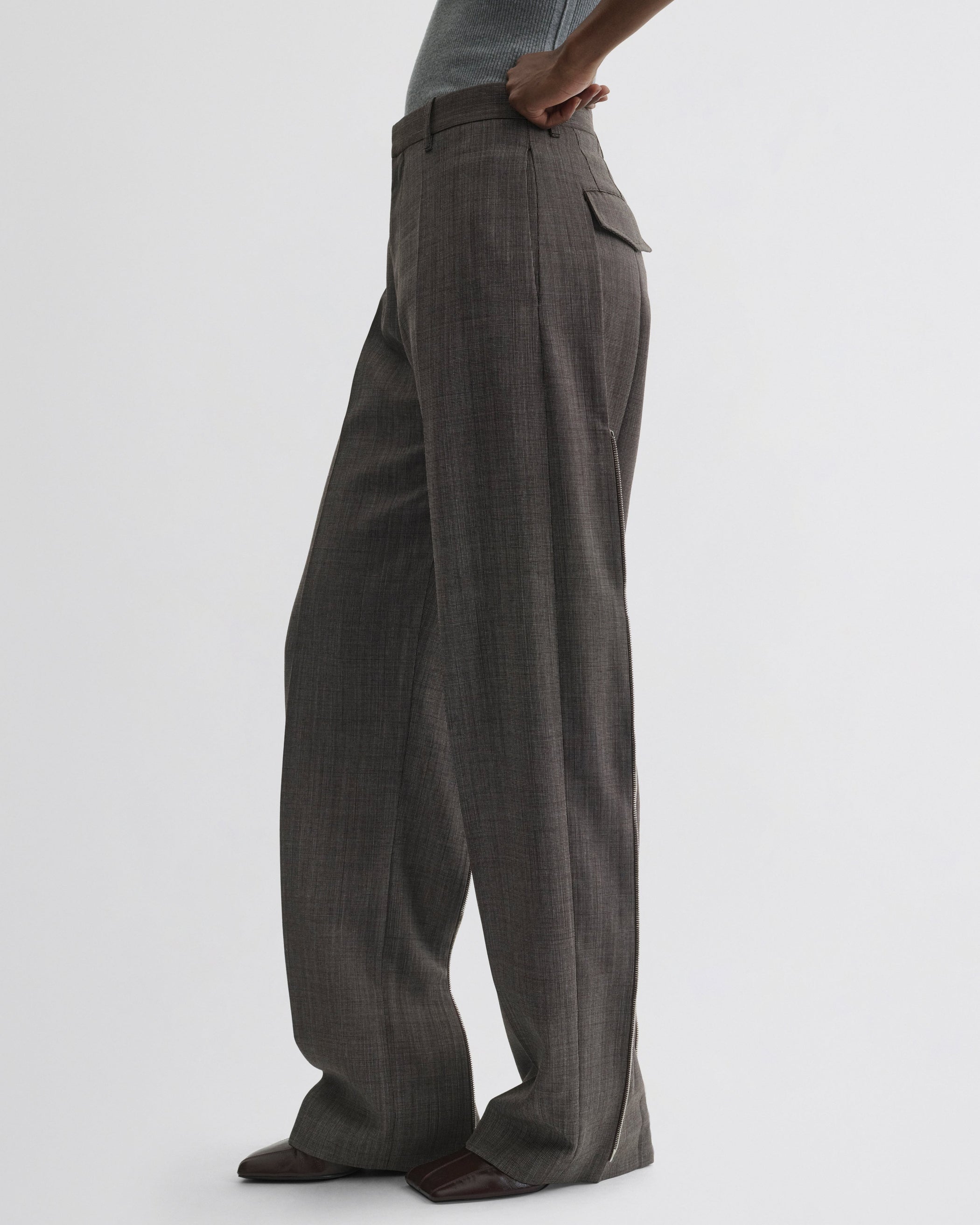 Side view of Split Zip Trousers in white dark brown wool