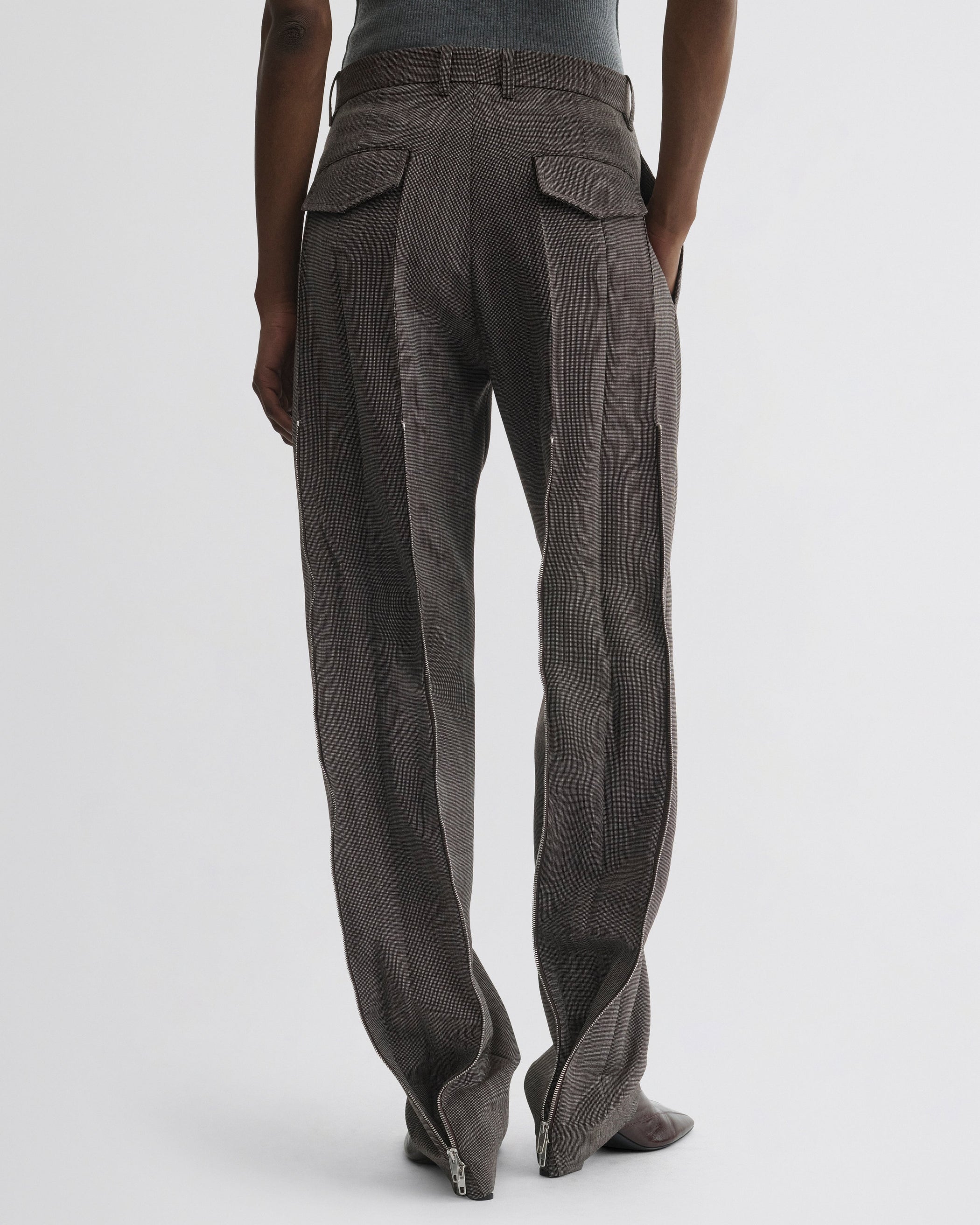 Back view of Split Zip Trousers in white dark brown wool