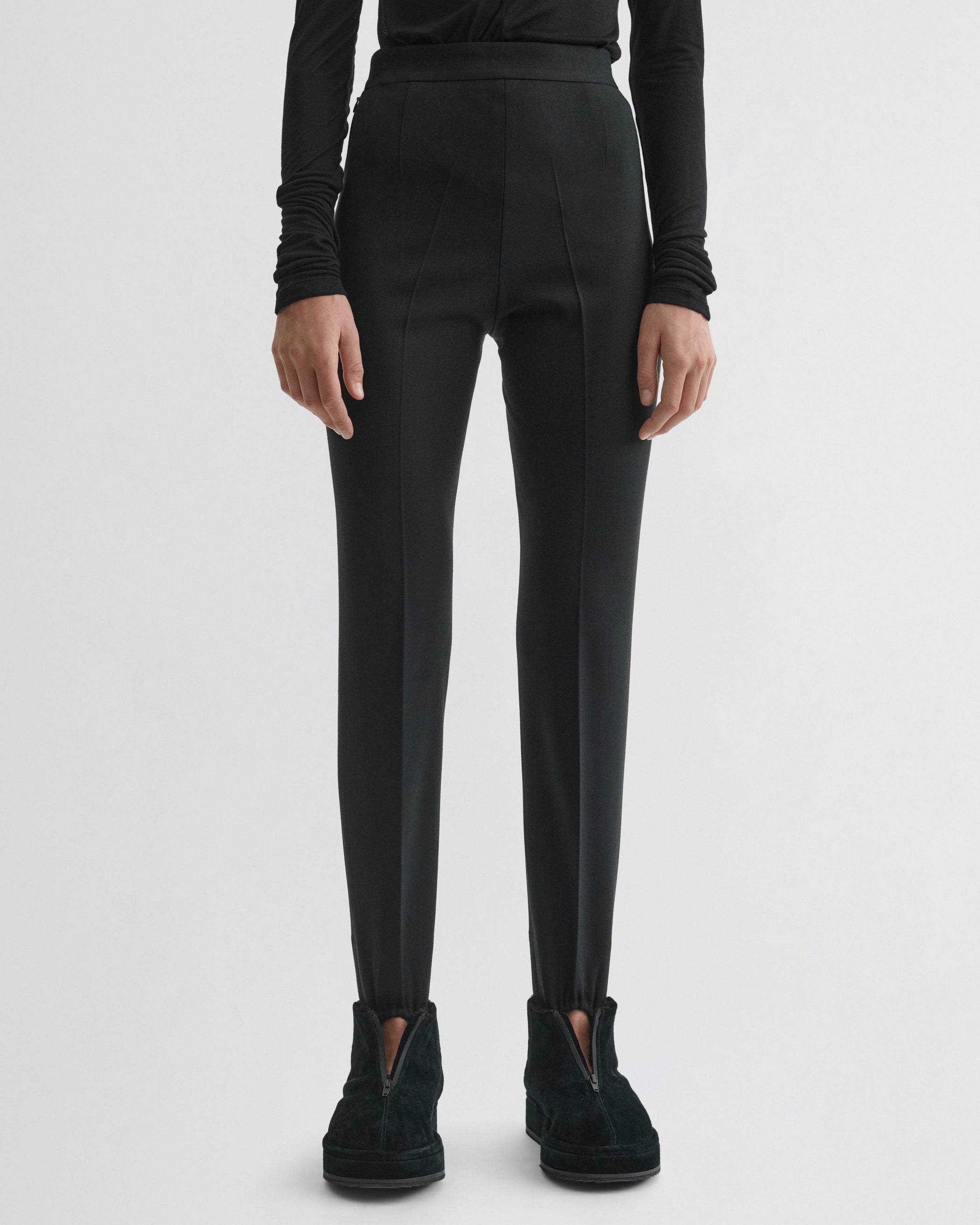 Front view of Stirrup Trousers in black wool