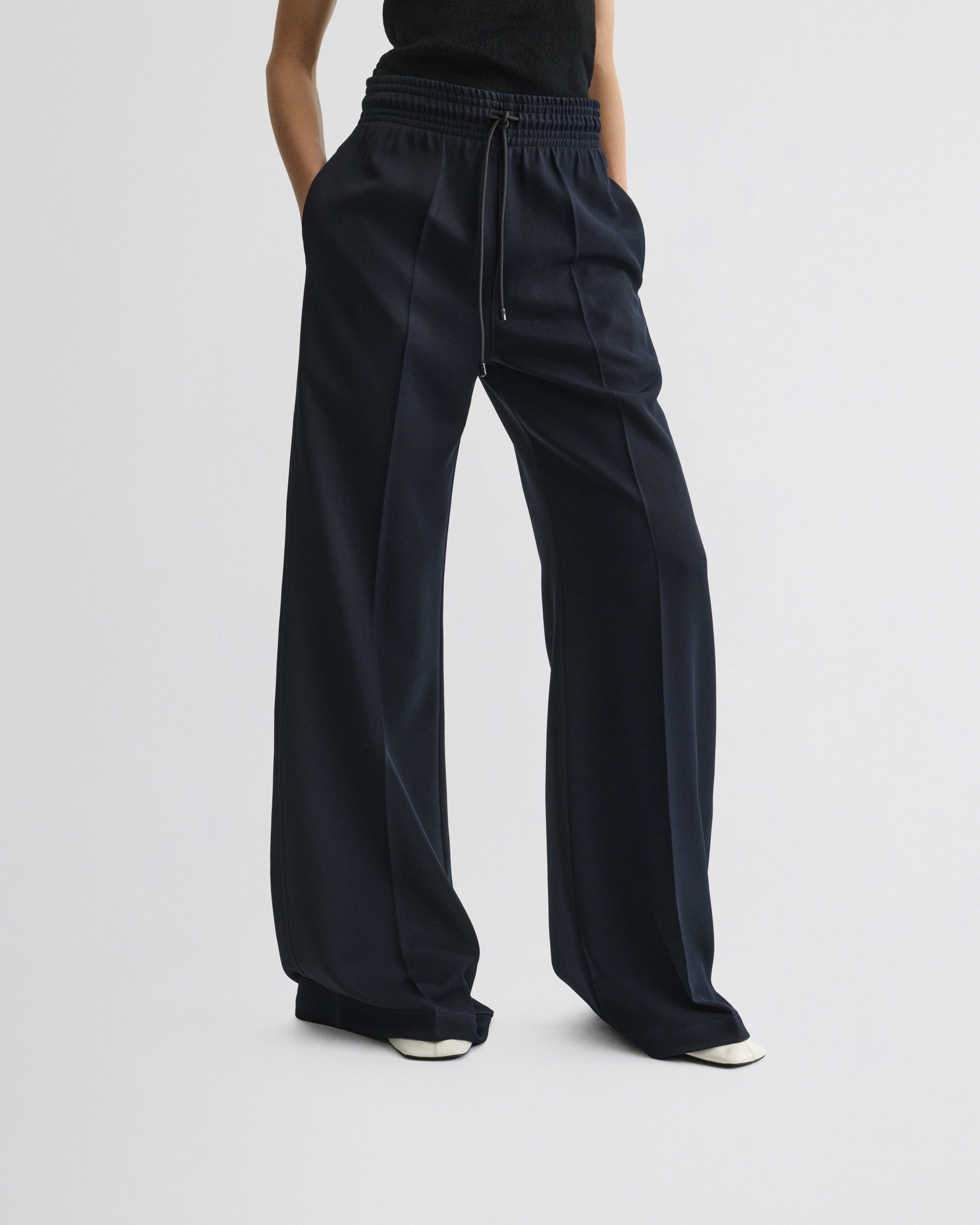 View of track trousers in navy polyester