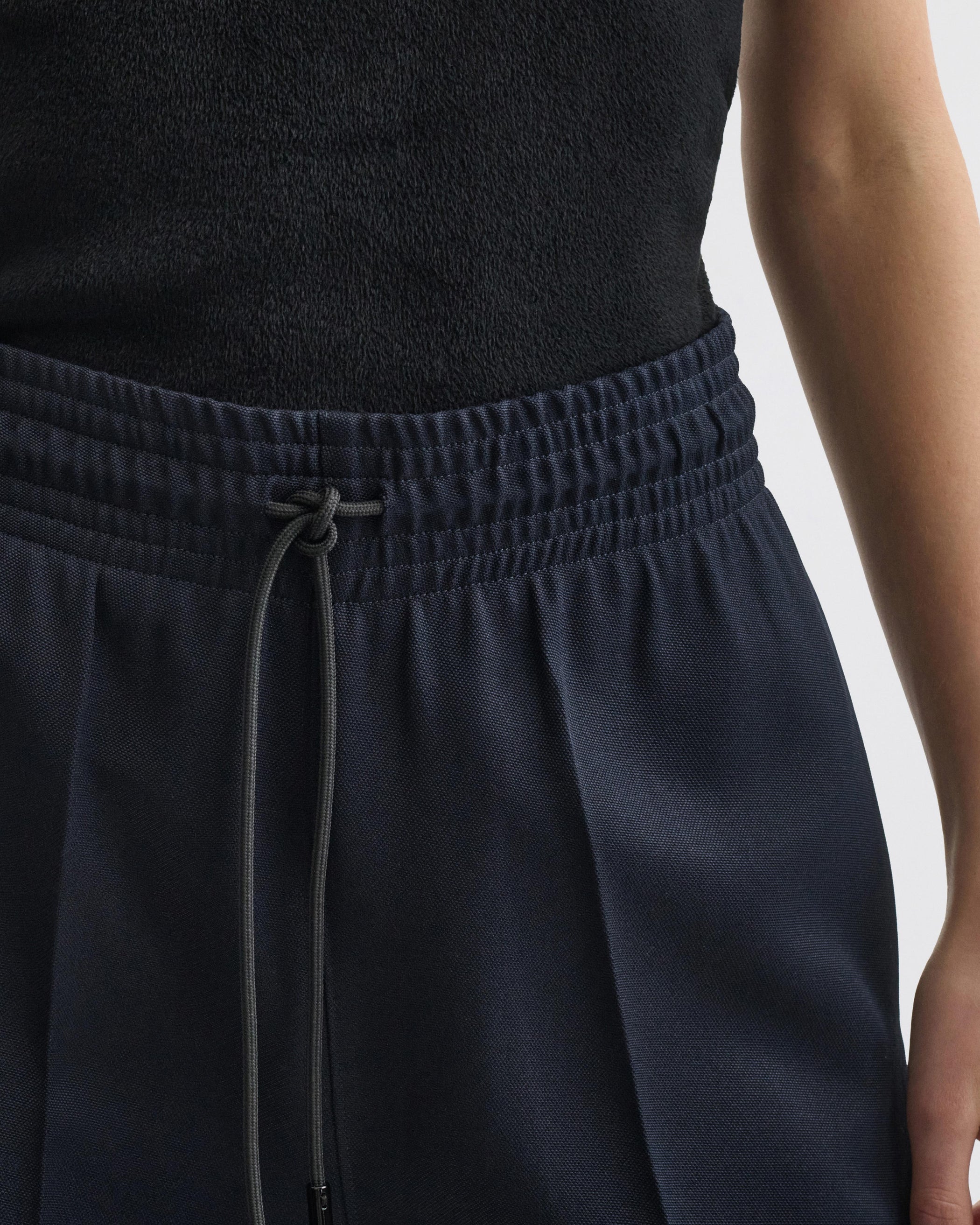 View of track trousers in navy polyester