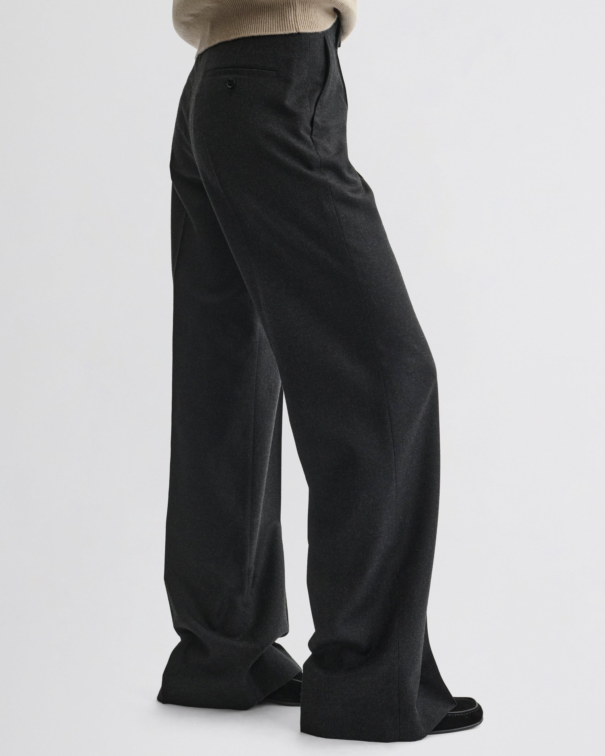 Side view of Boyish Tailored Trousers in charcoal wool