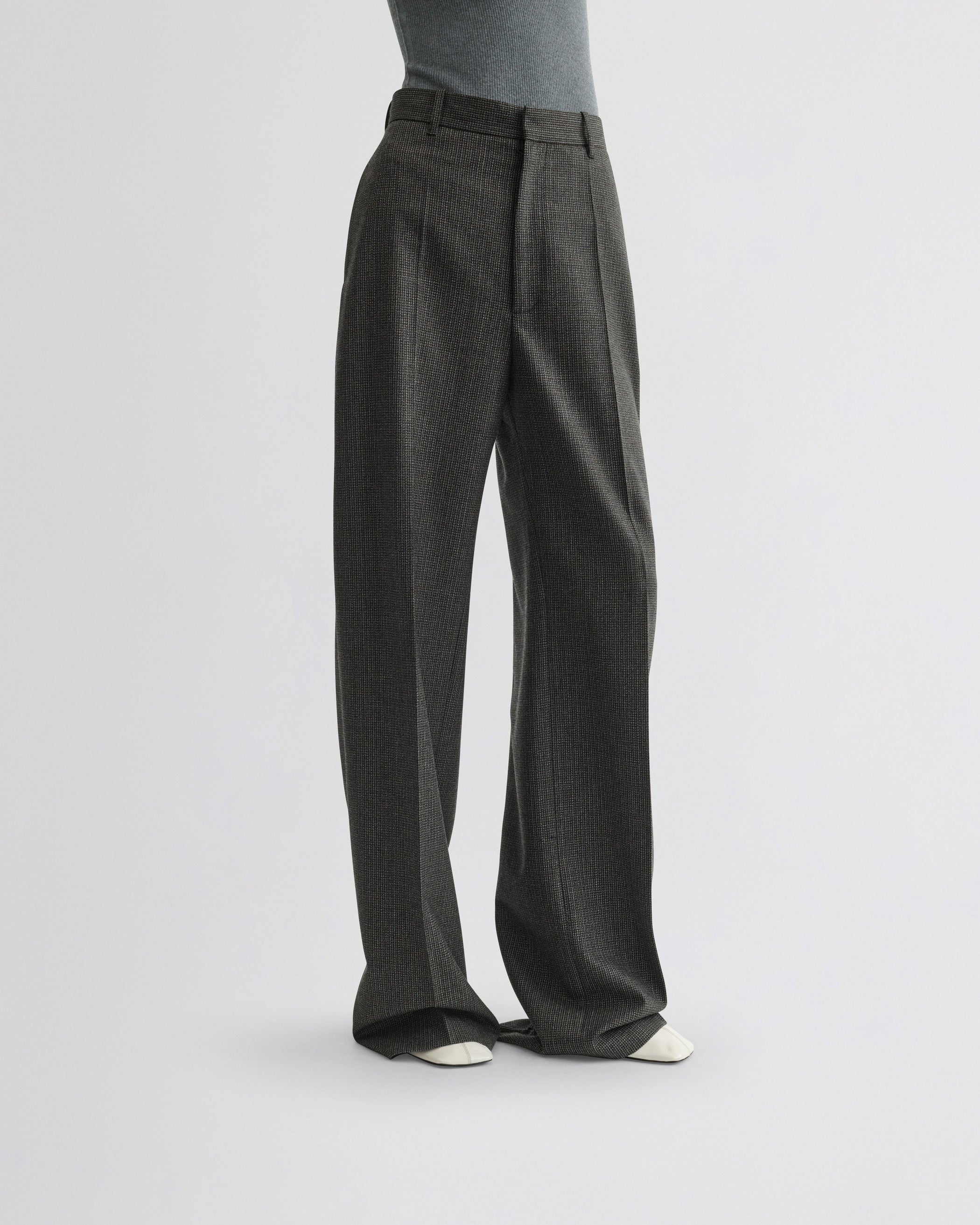View of zip trousers in grey brown melange