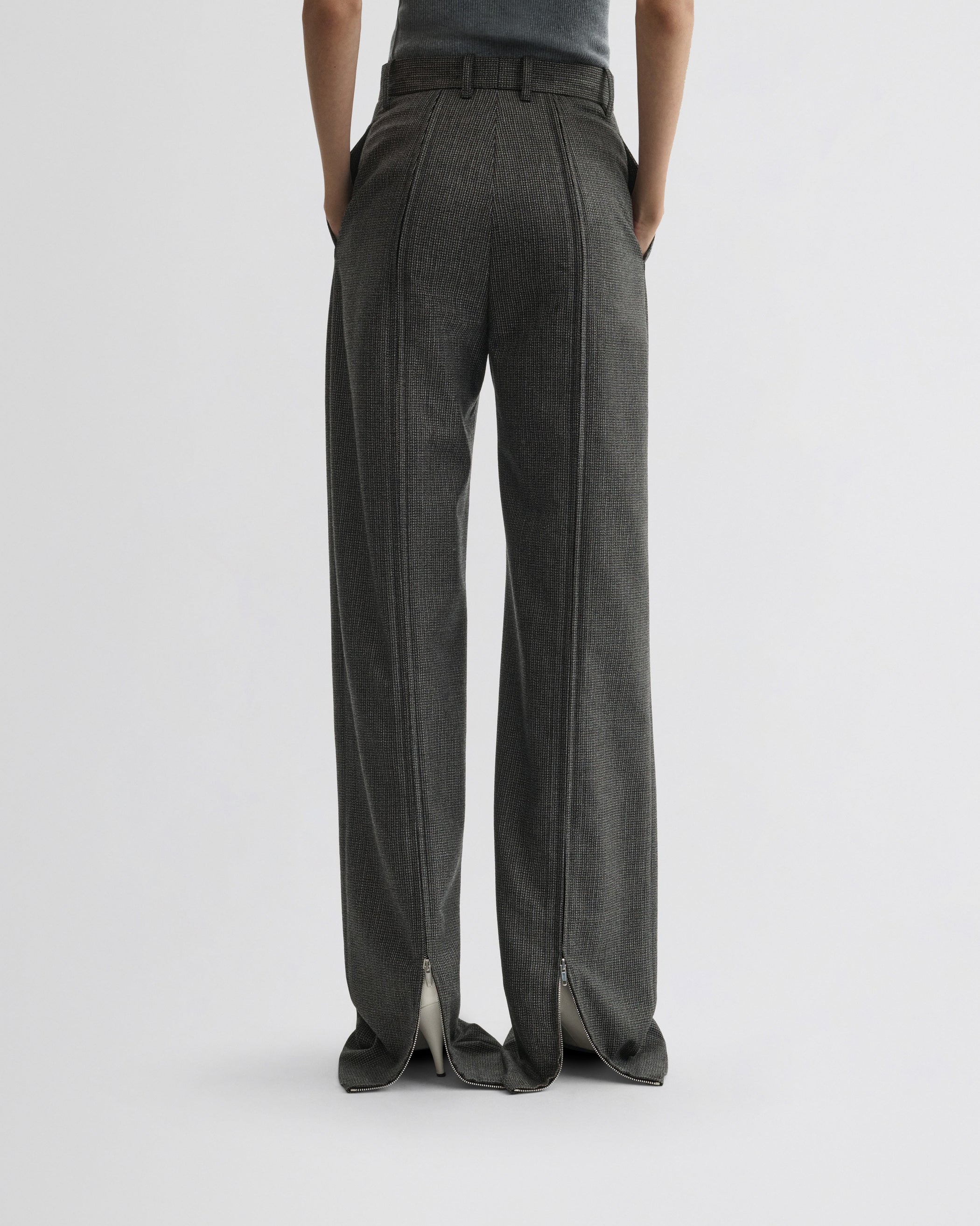 View of zip trousers in grey brown melange
