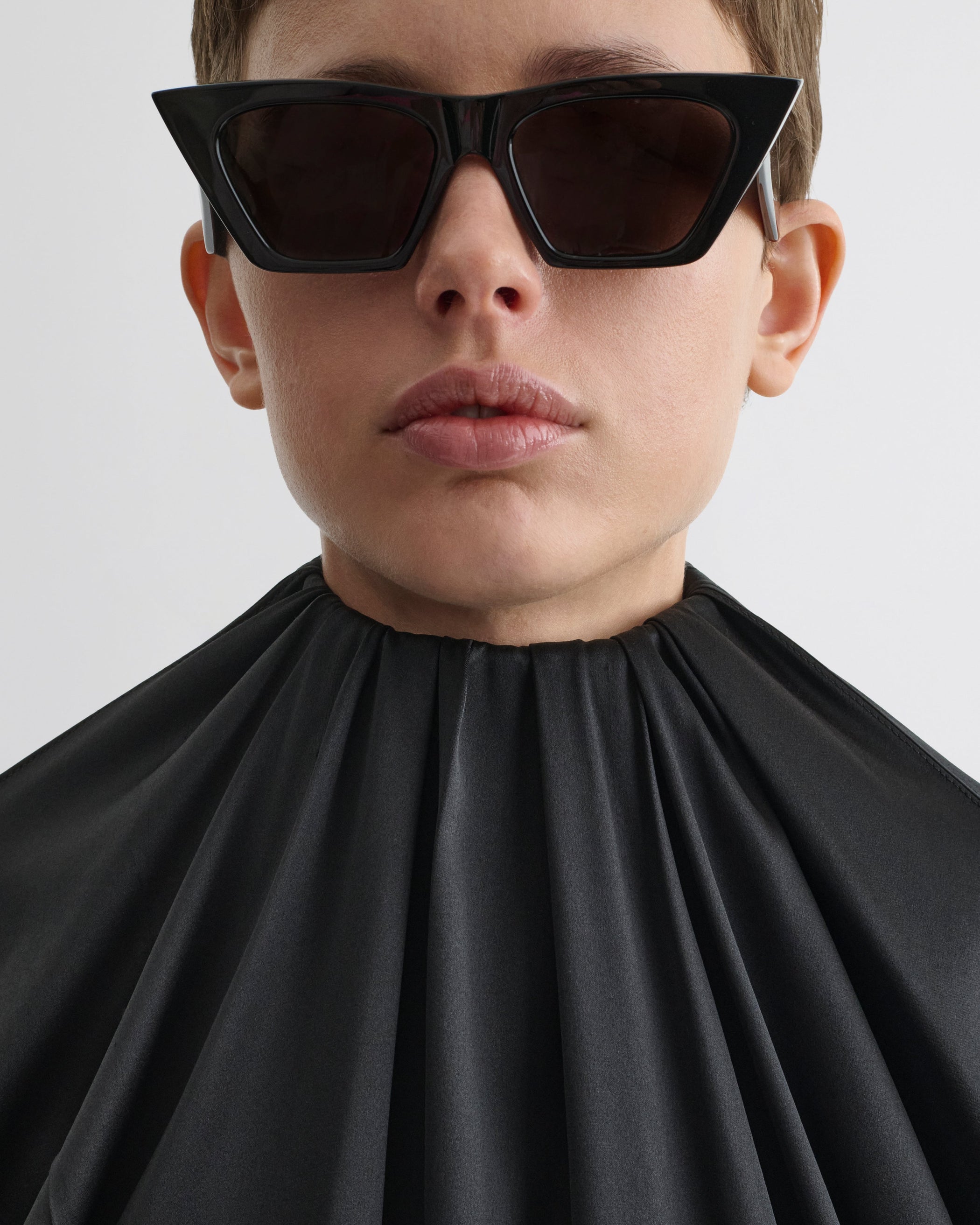 Close up detail view of LIQUID SOFT RIDGE TOP in black silk