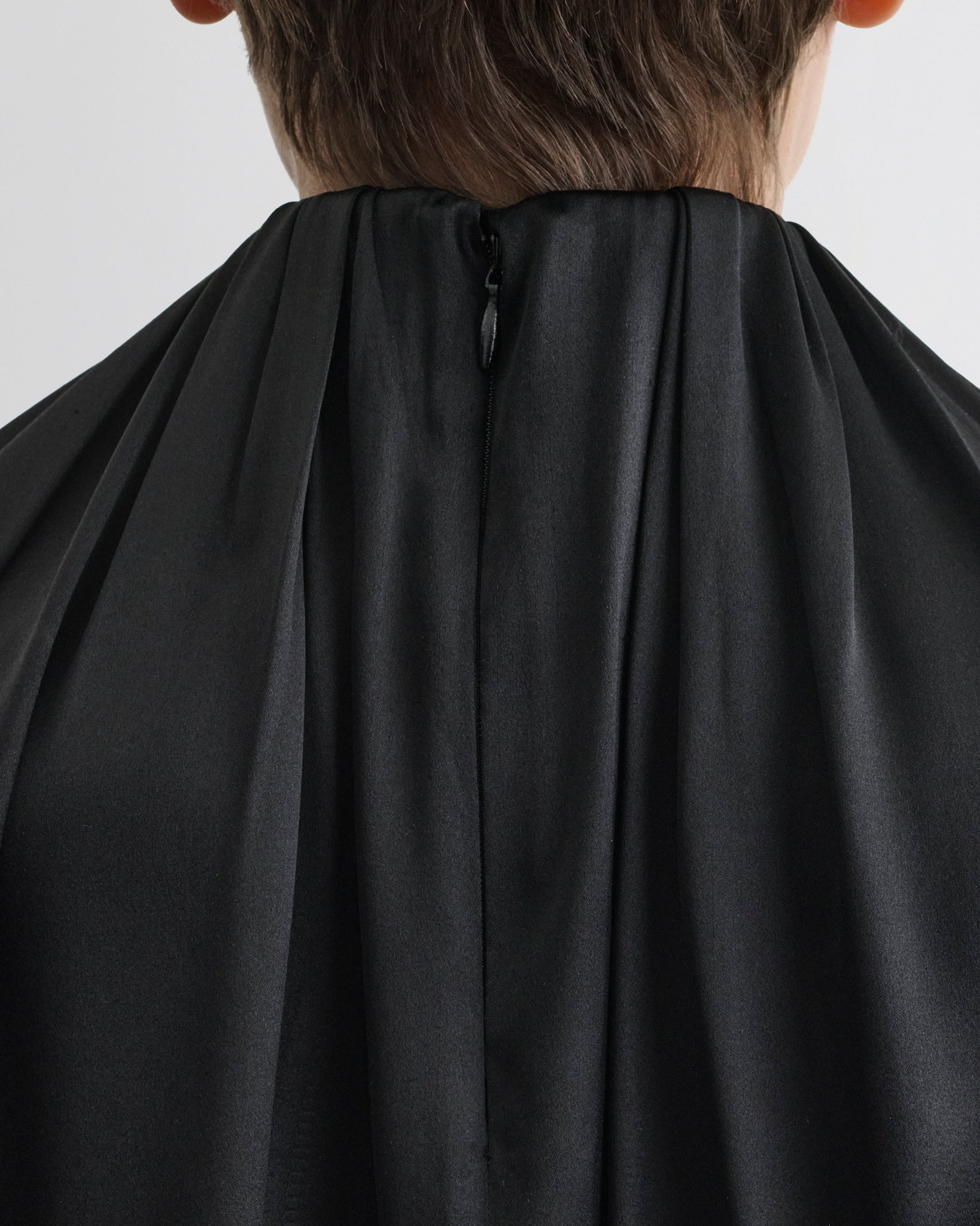 Close up detail view of LIQUID SOFT RIDGE TOP in black silk